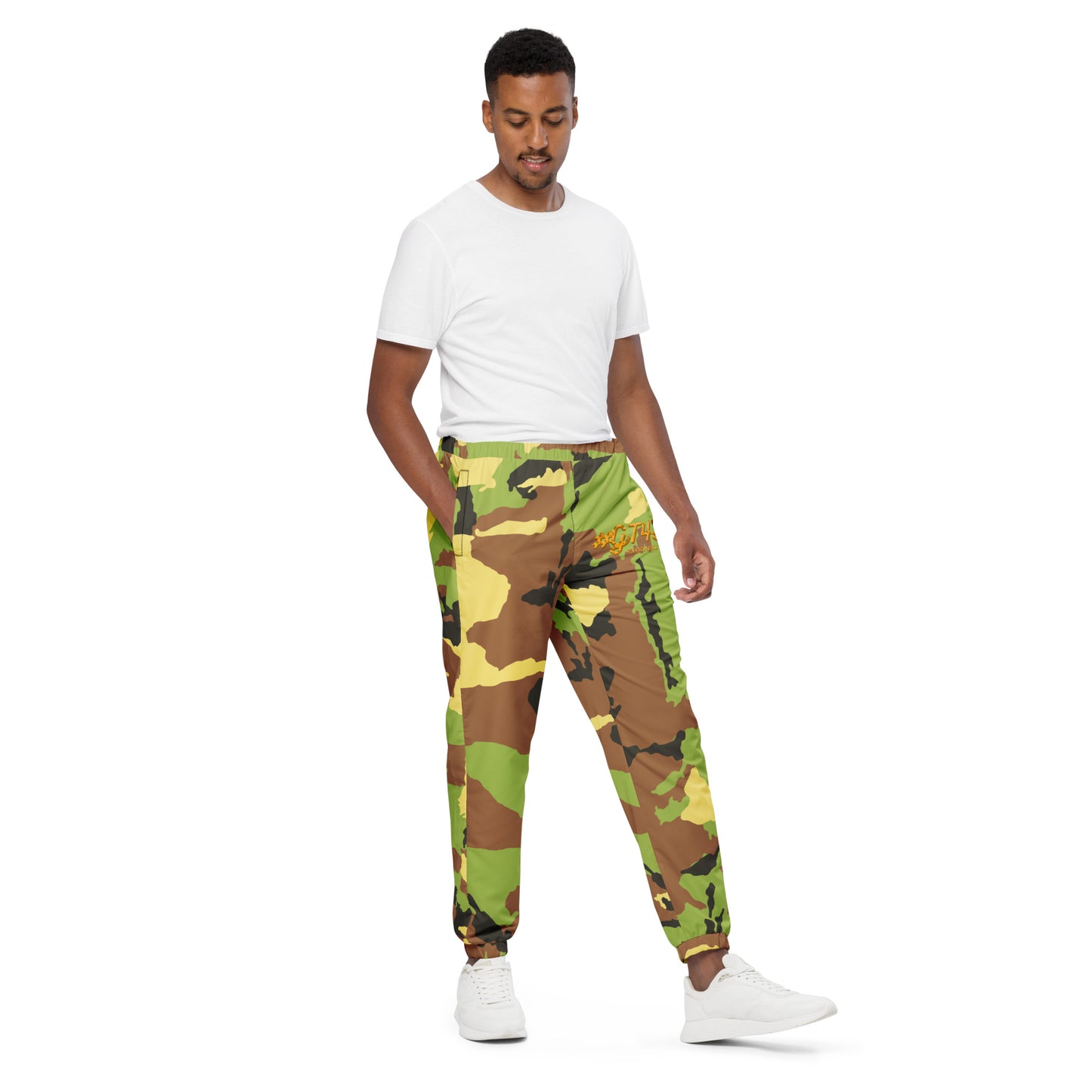 Person wearing camouflage pants and a white shirt on a white background