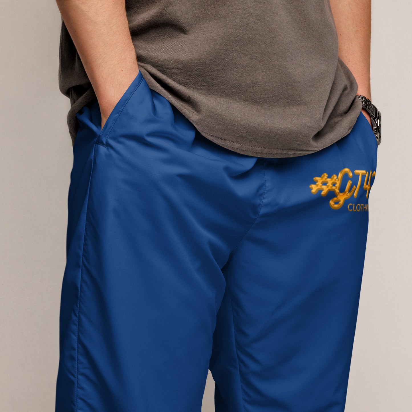 #GT4L all-over-print-men's-track-pants-blue-zoomed-in-6845f6c3dd813