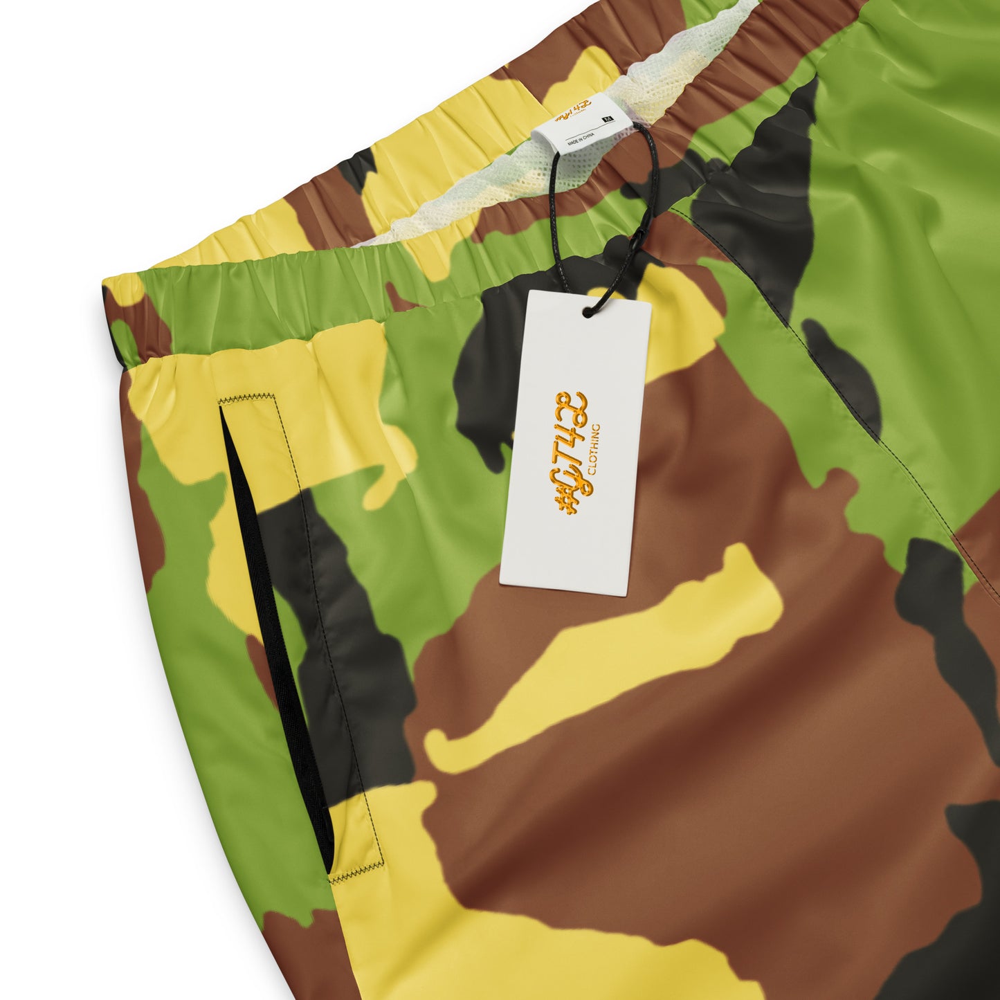 Camouflage shorts with a brand tag on a white background
