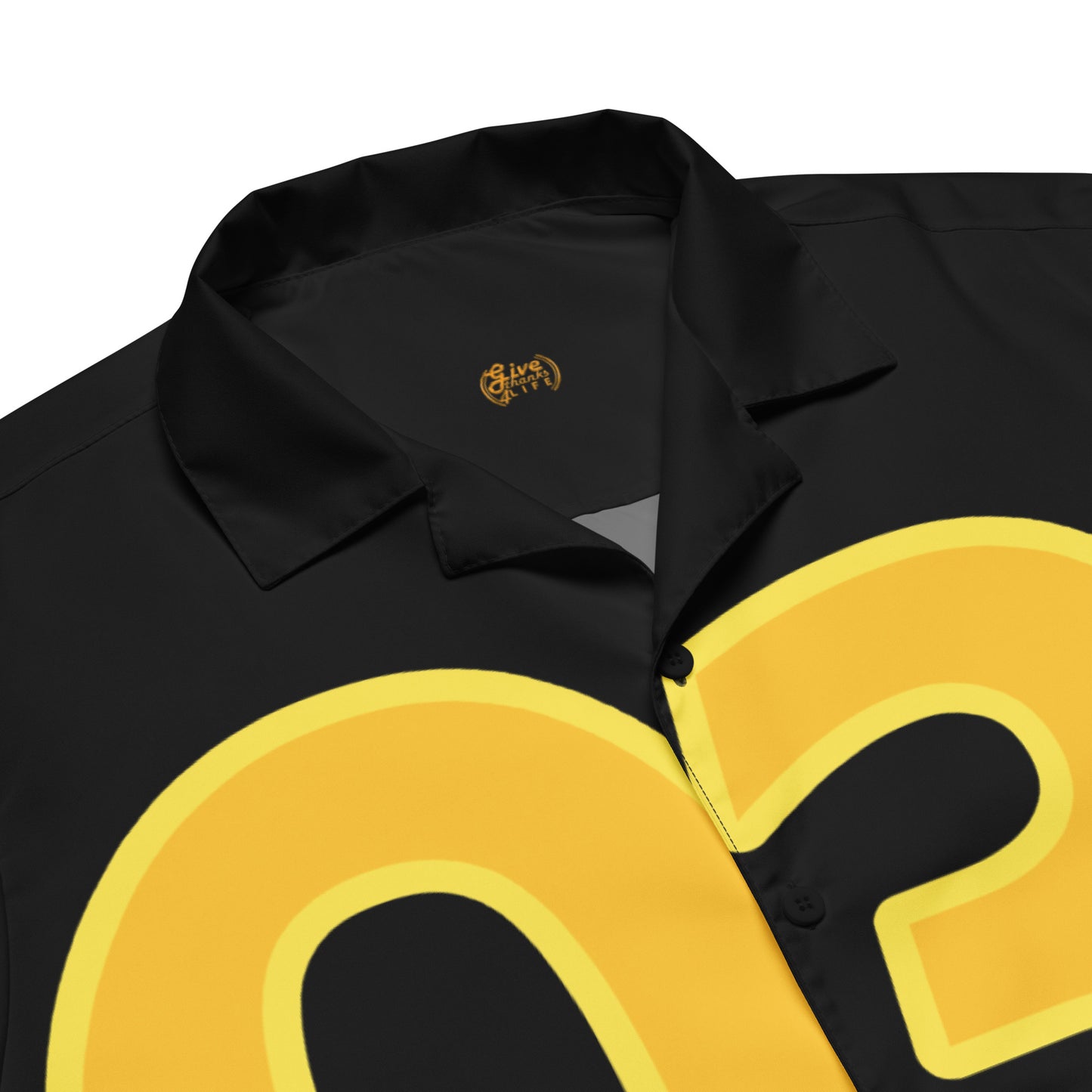 Black polo shirt with yellow number 82 on a white background