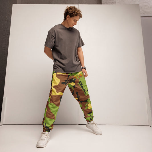 Person wearing a gray t-shirt and camouflage pants against a white background