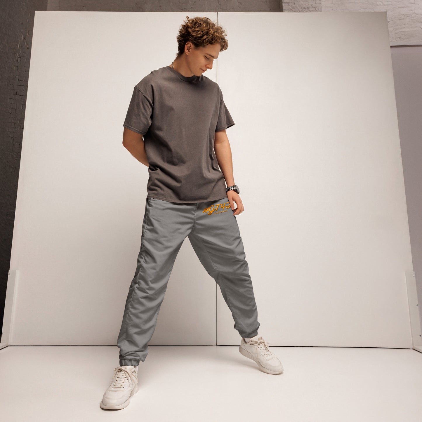 #GT4L all-over-print-unisex-track-pants-black-front-683efd858308f