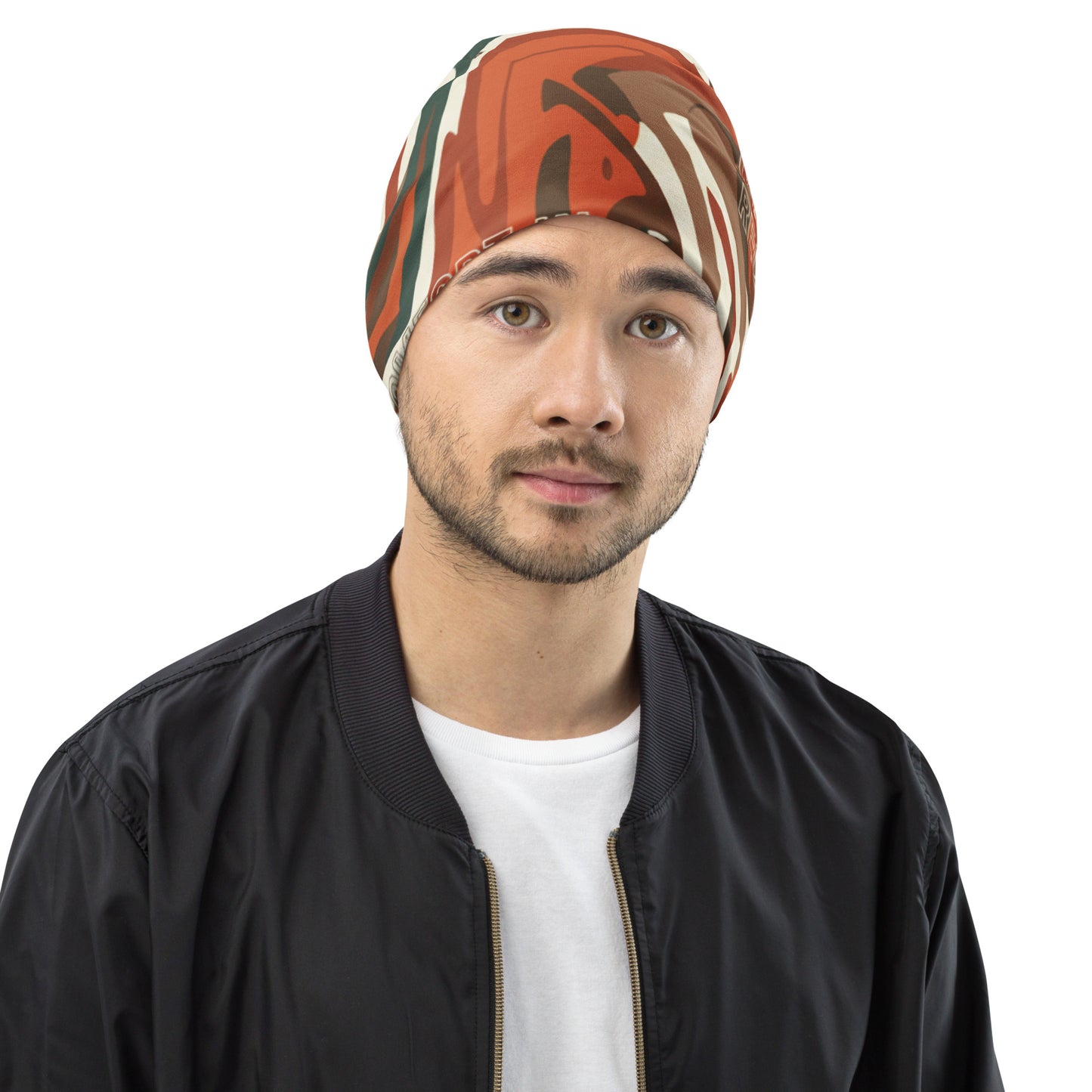 Man wearing a colorful headscarf on a white background