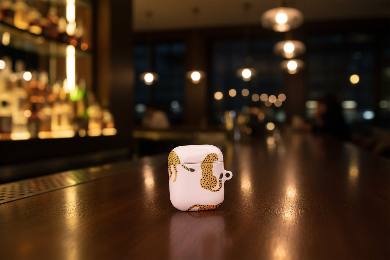 Leopard Print Airpods sitting on a Bar