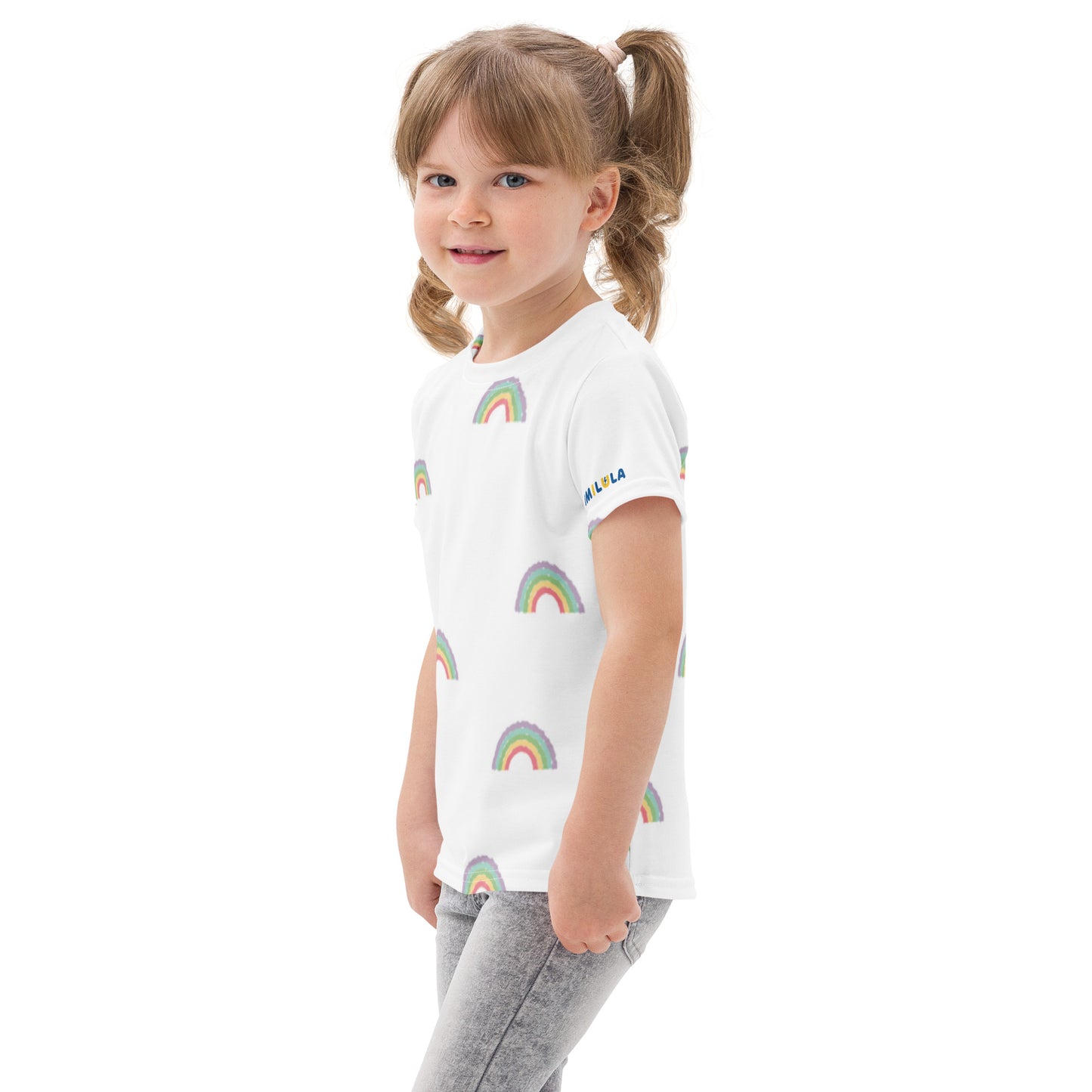 Young girl wearing a white t-shirt with floral patterns on a white background