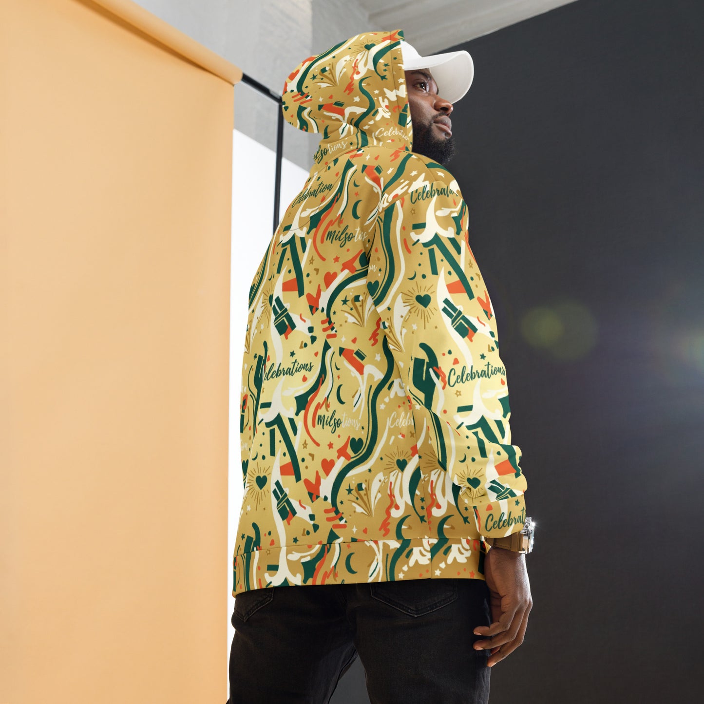 Person wearing a colorful patterned hoodie with a blurred background