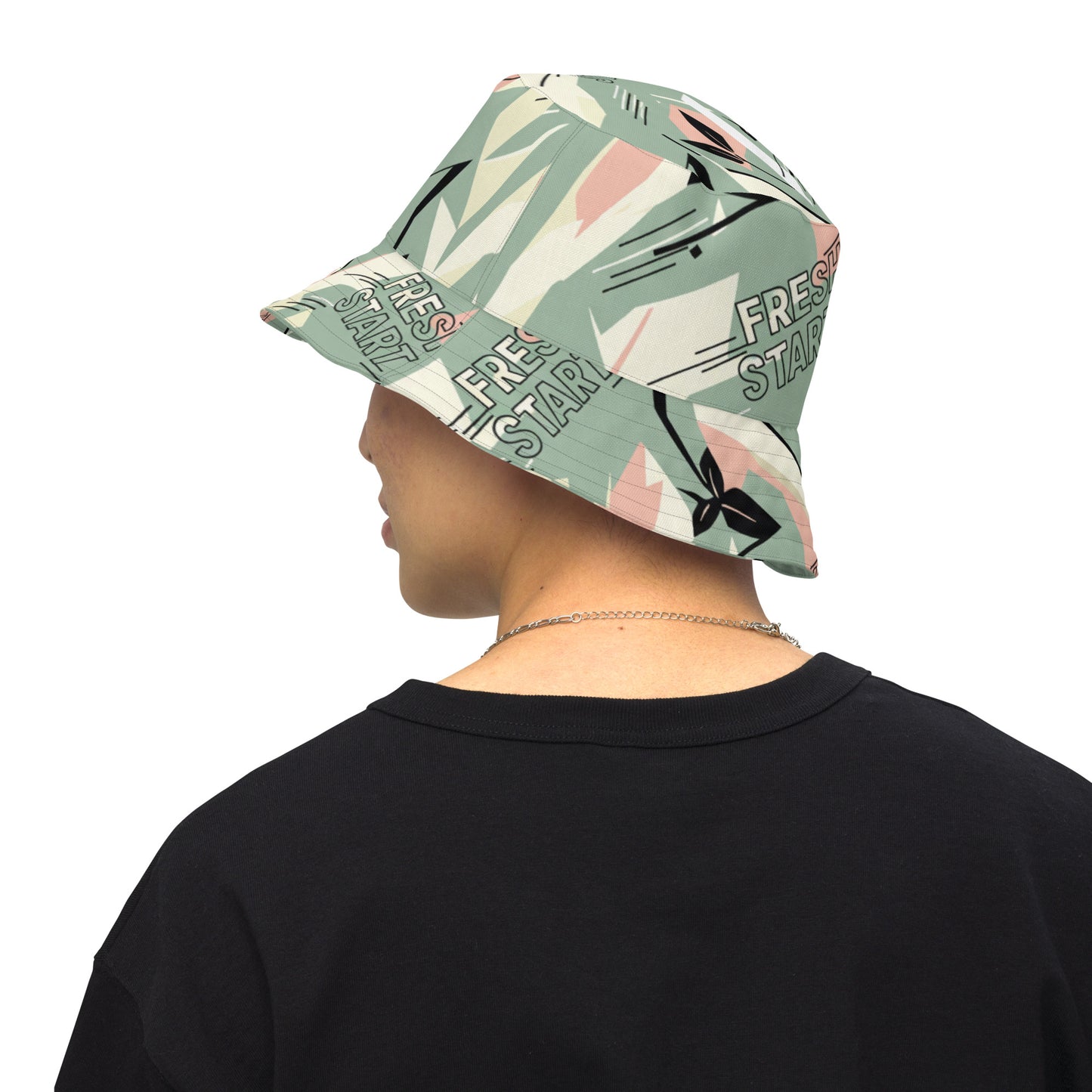 Person wearing a patterned bucket hat with text on a white background