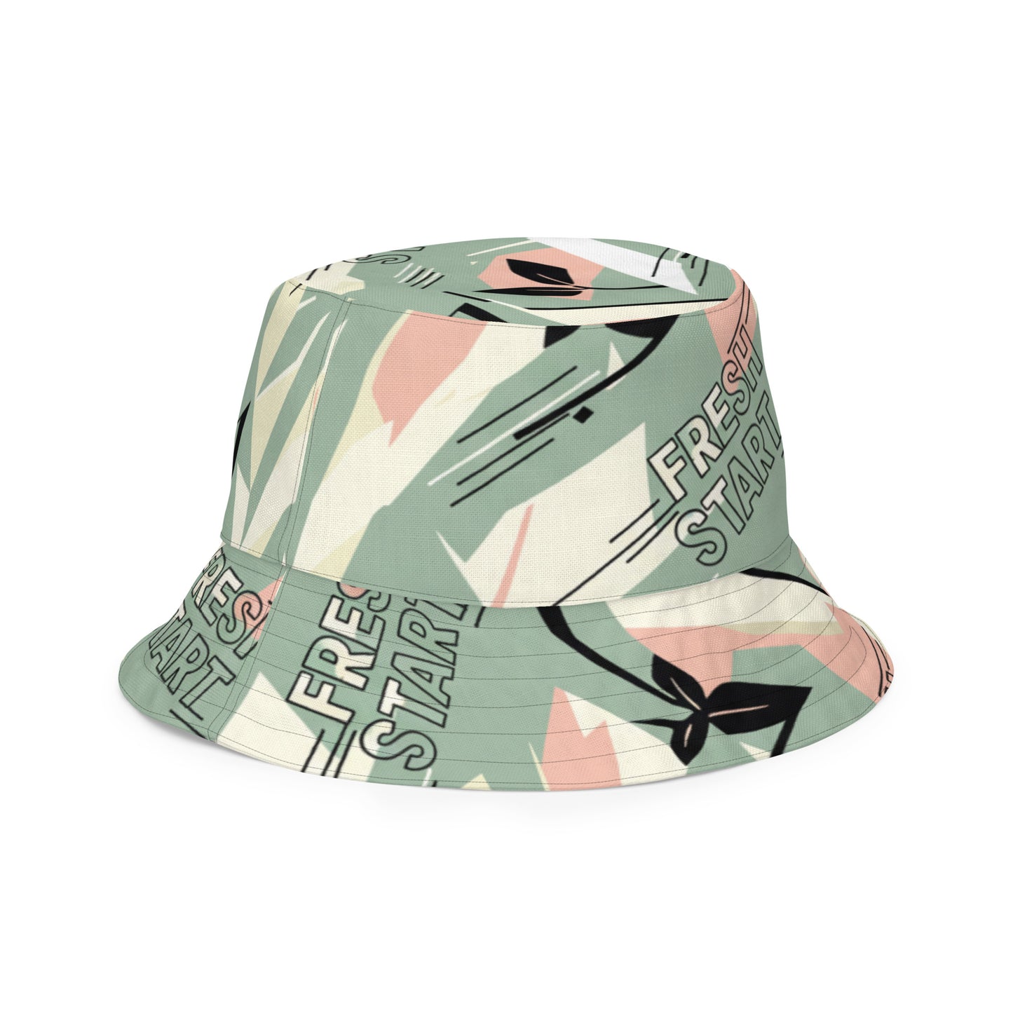 Bucket hat with tropical leaf and 'Fresh Start' text pattern on a white background