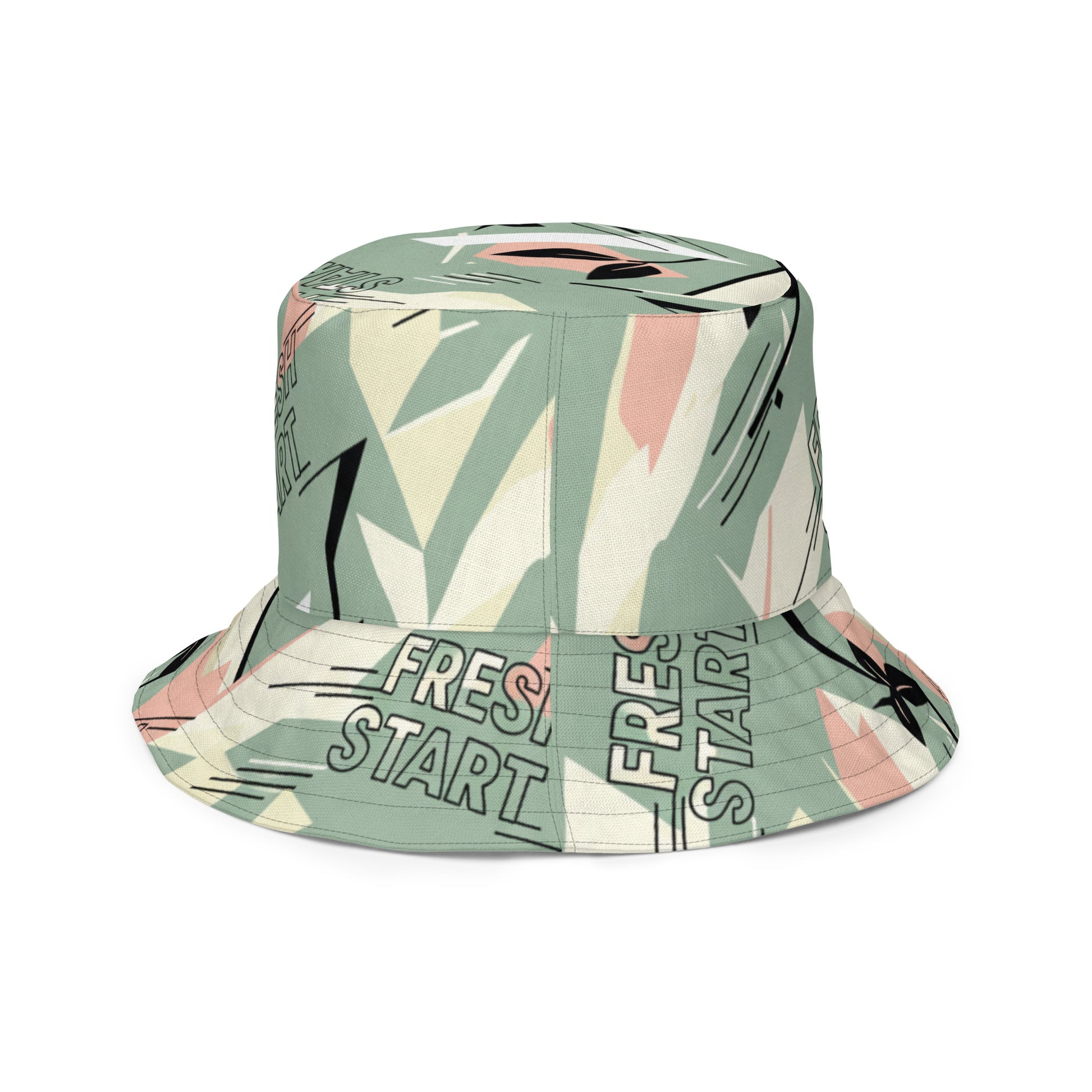 Bucket hat with tropical leaf pattern and 'Fresh Start' text on a white background