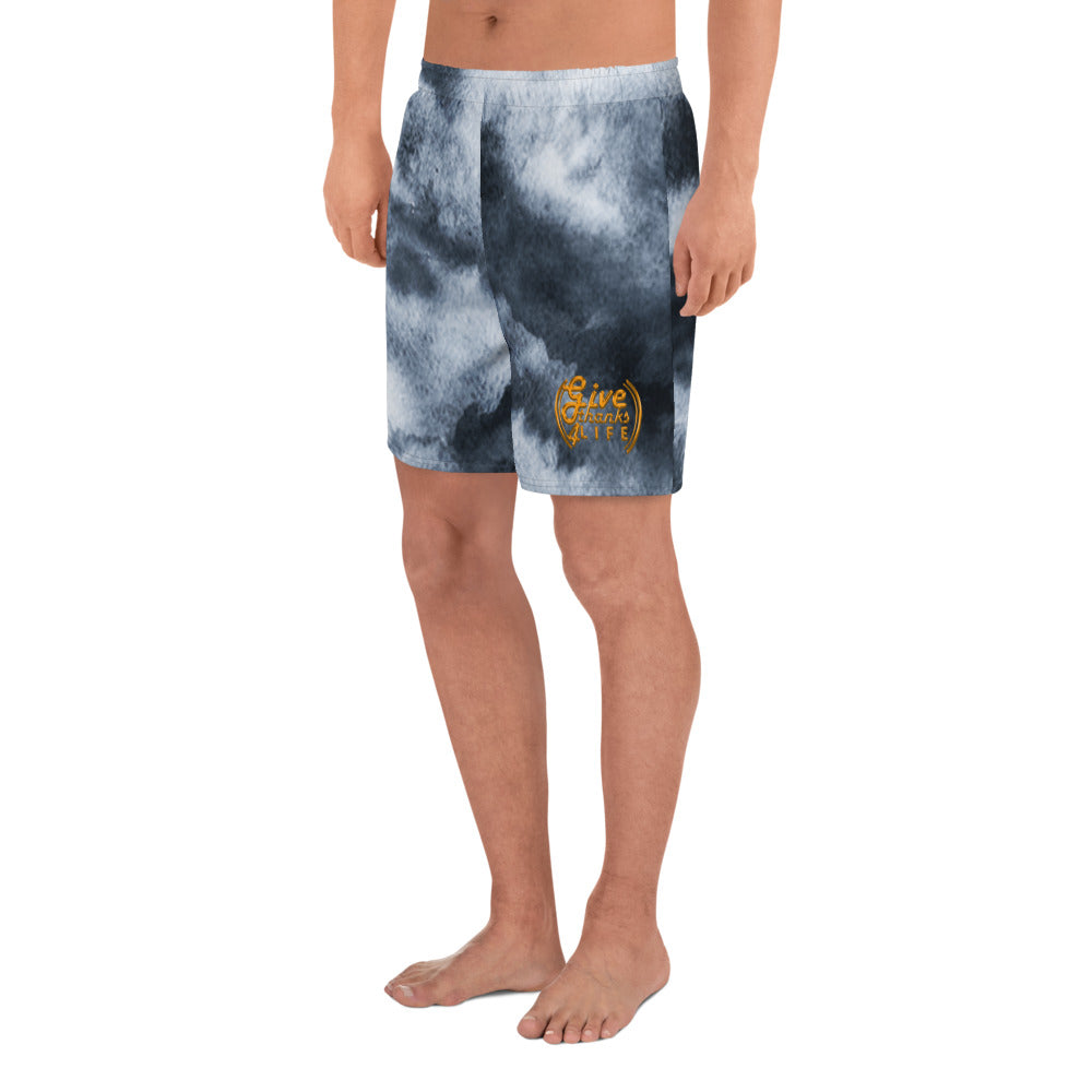 Tie-dye swim shorts with a logo on a white background