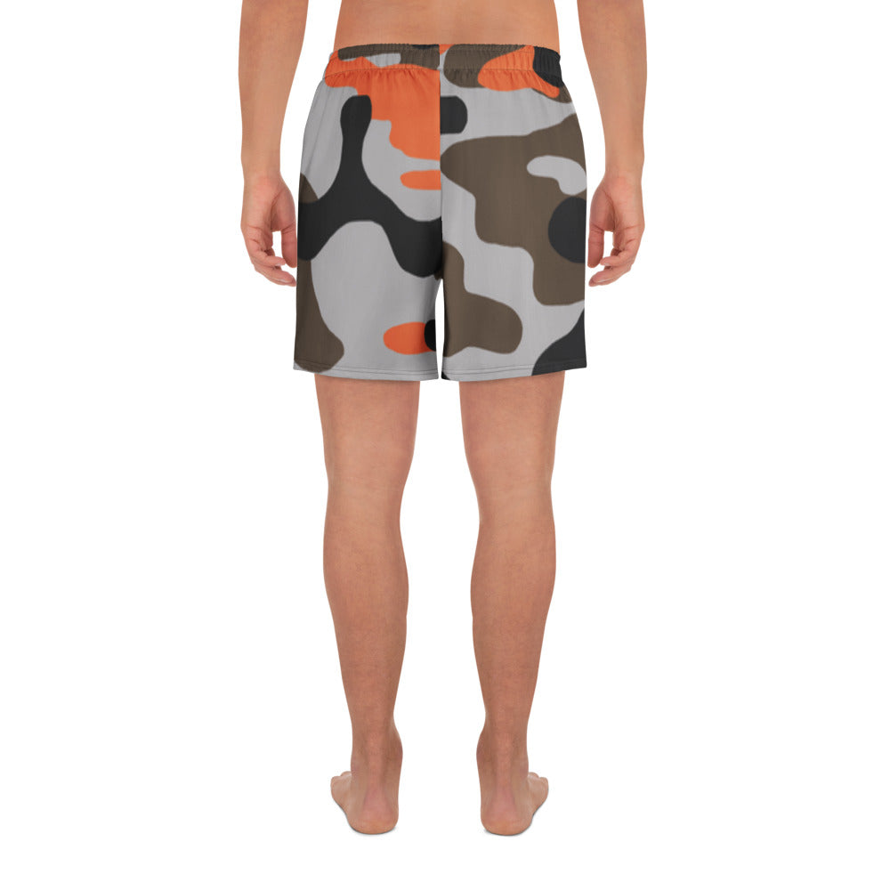 Camouflage-patterned swim shorts on a white background