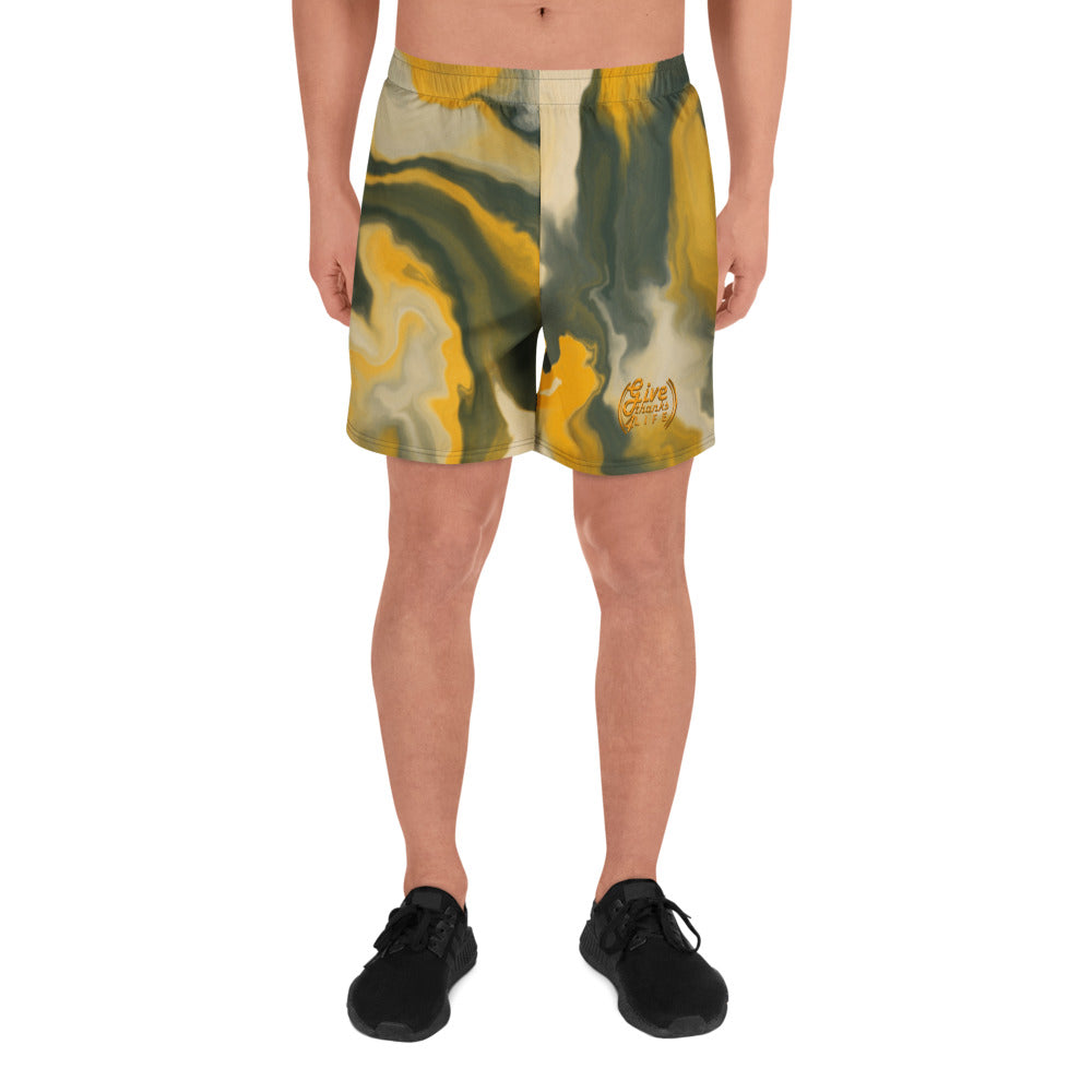 Person wearing a colorful swimsuit with a logo on a white background