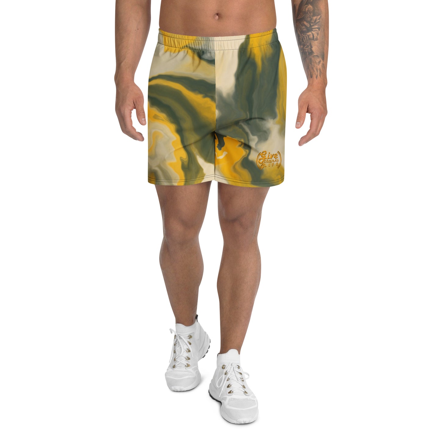 Person wearing tie-dye shorts on a white background