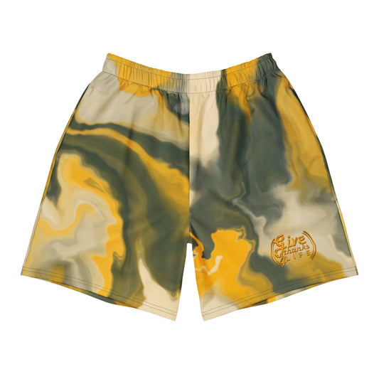 Marbled shorts with yellow and green pattern on a white background