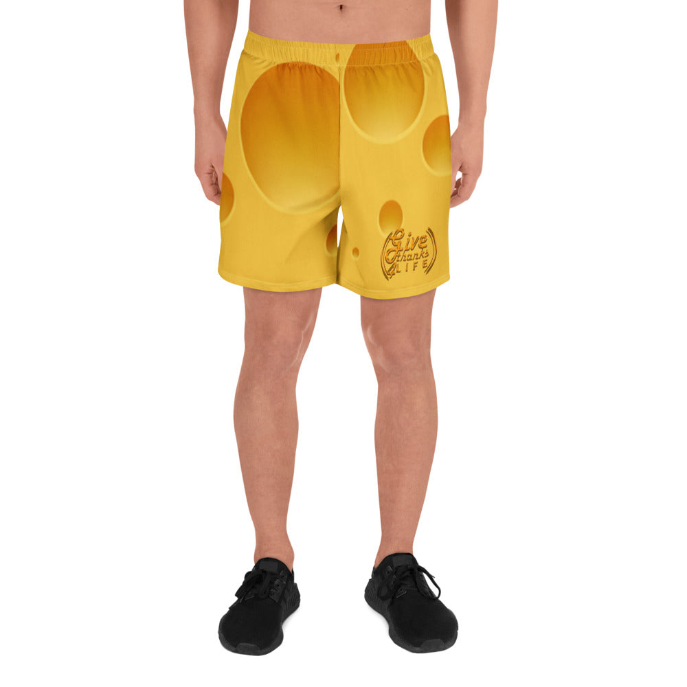 Yellow shorts with cut-out design on a white background