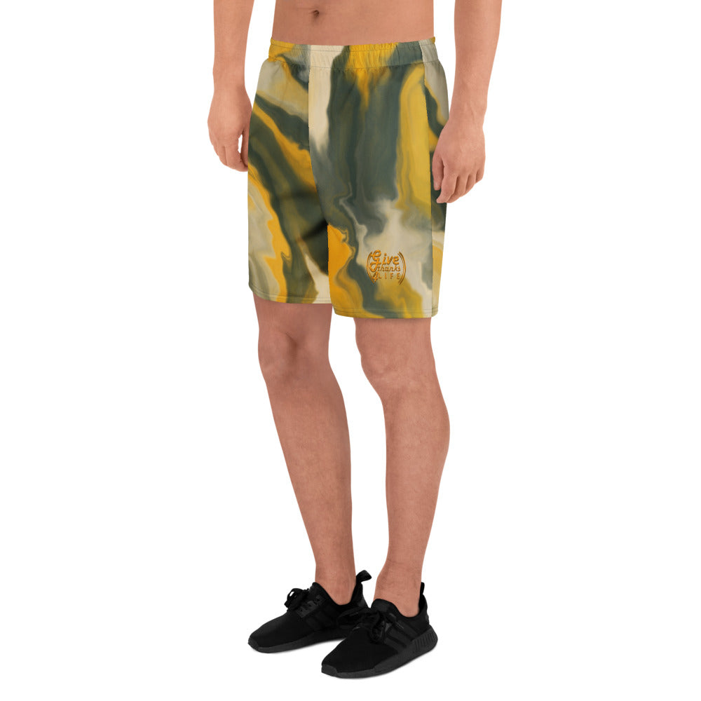Person wearing camouflage shorts on a white background