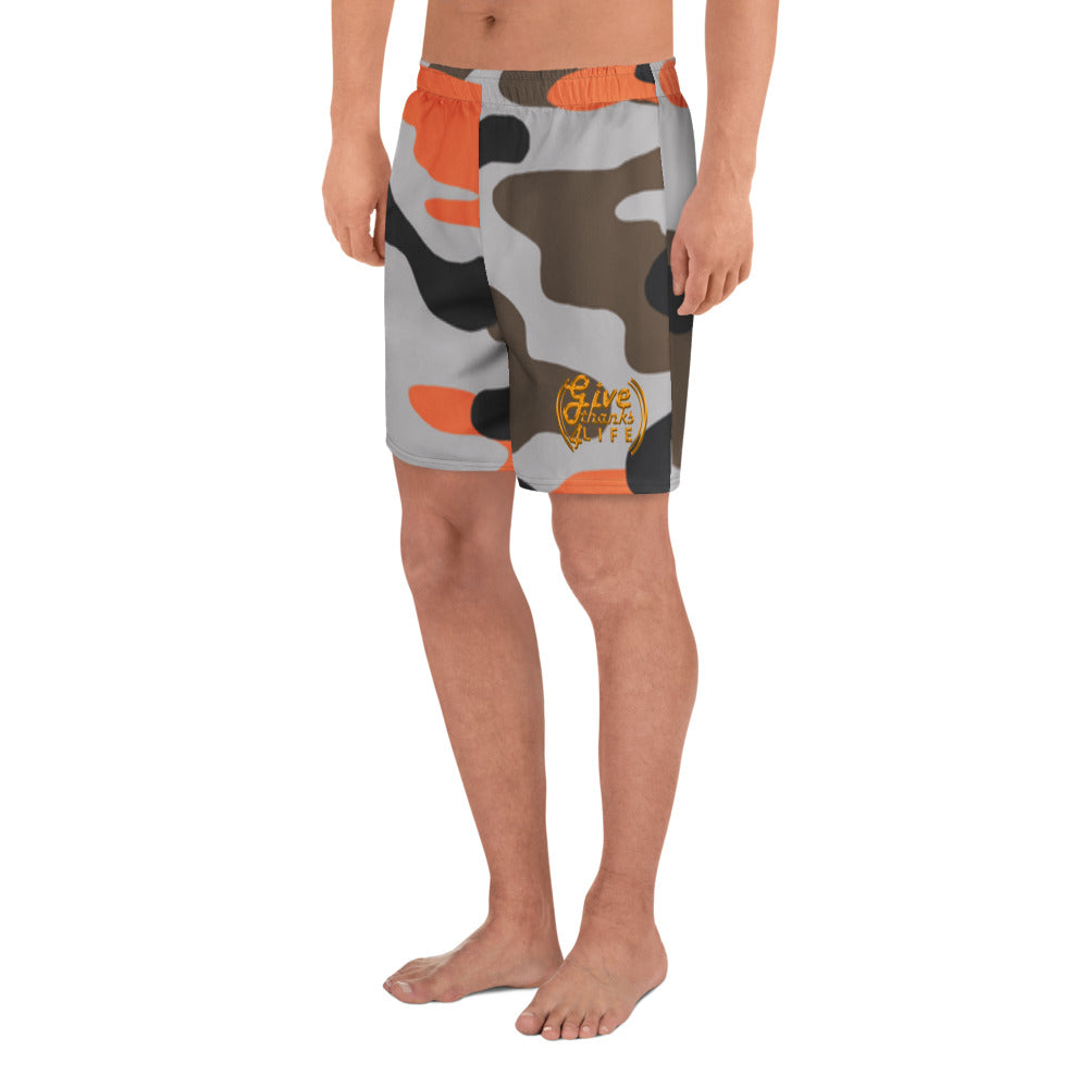 Camouflage-patterned swim shorts on a white background