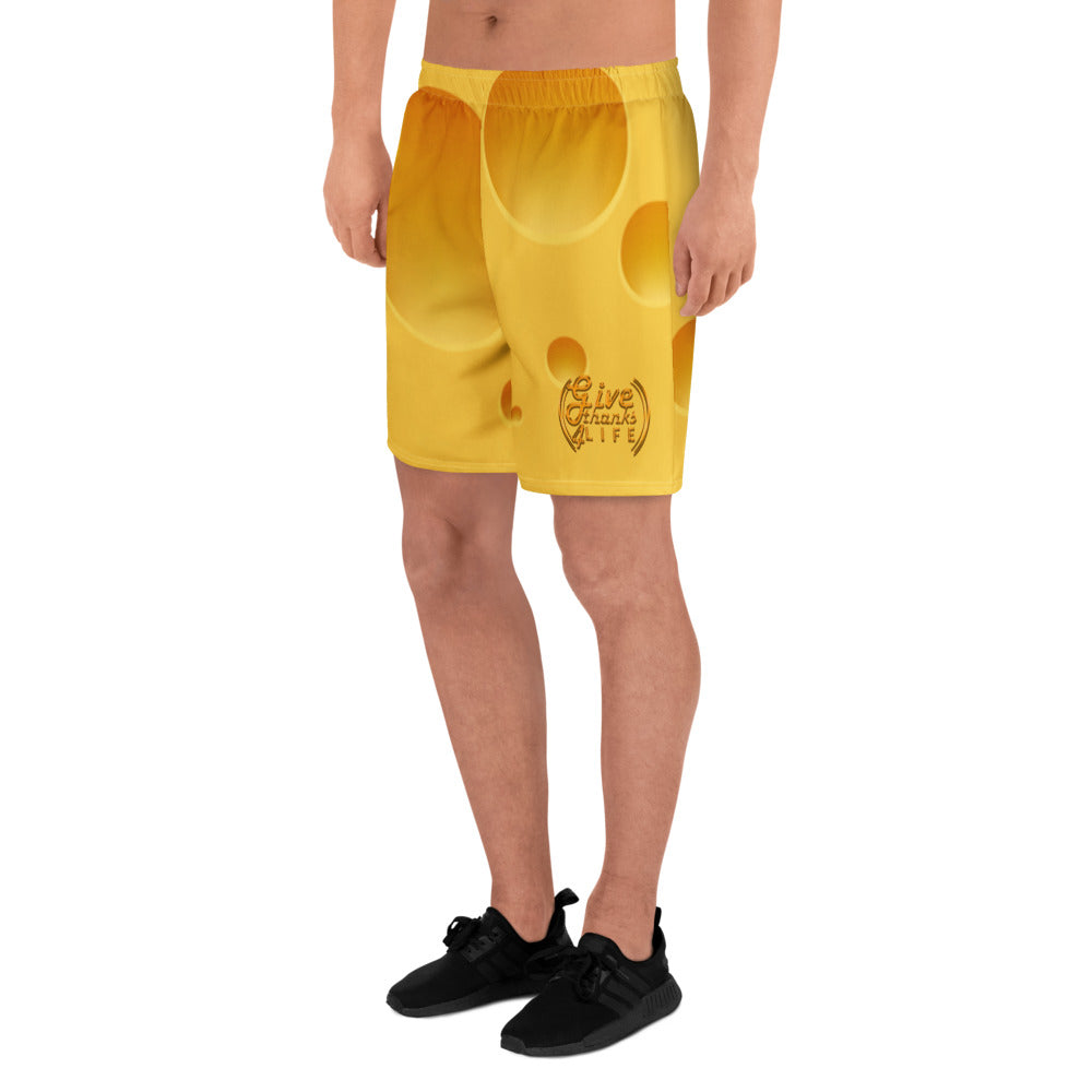Yellow shorts with a logo on a white background