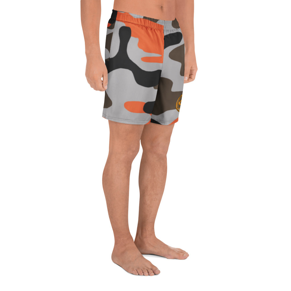 Person wearing camouflage shorts on a white background