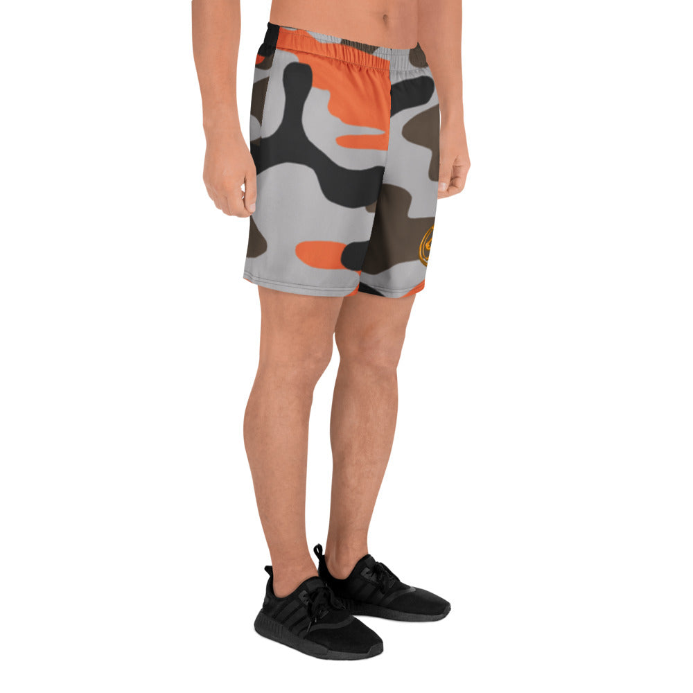 Person wearing camouflage shorts on a white background