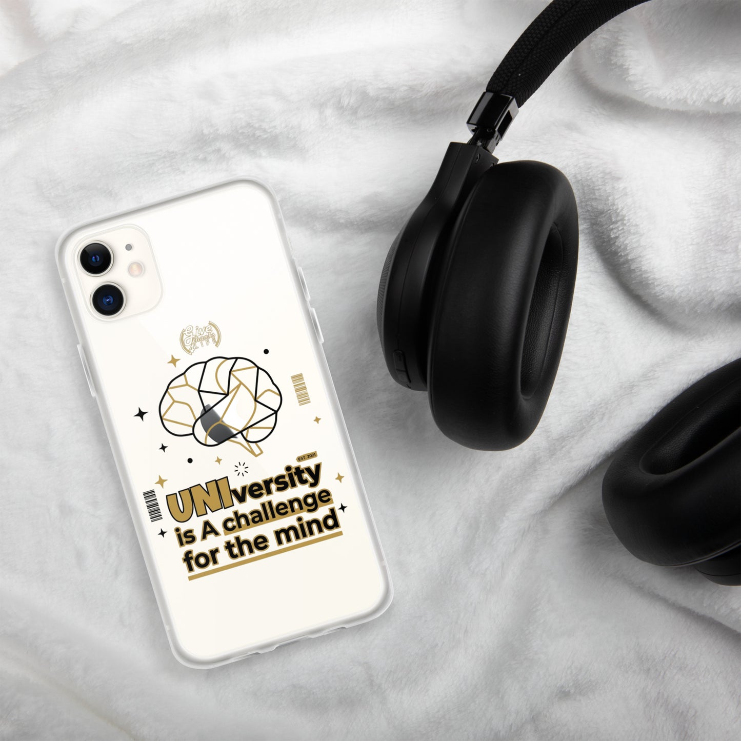 Phone case with 'UNIversity is A challenge for the mind' text and brain graphic on a marble surface with headphones.