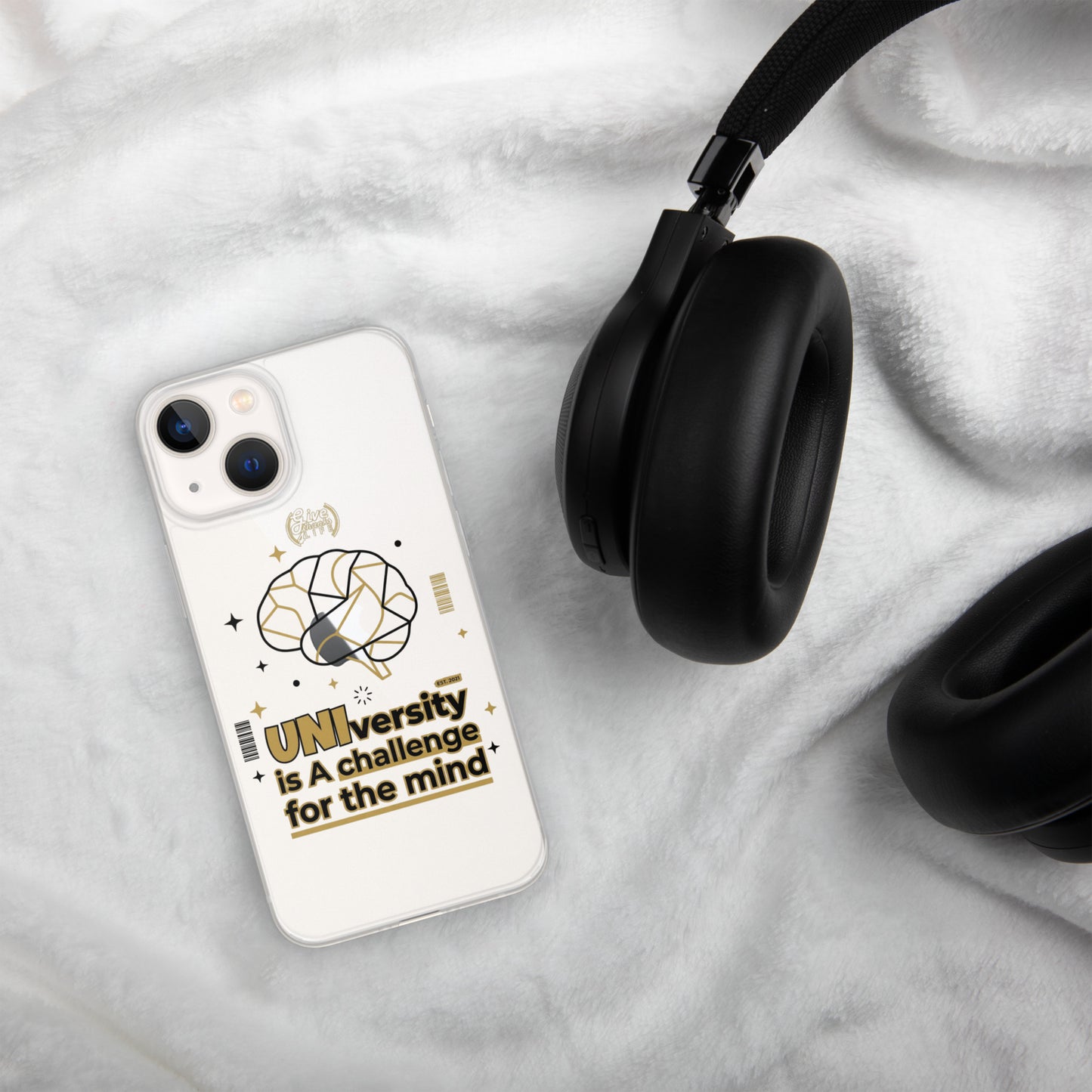 Phone case with text and graphic design on a white surface with headphones