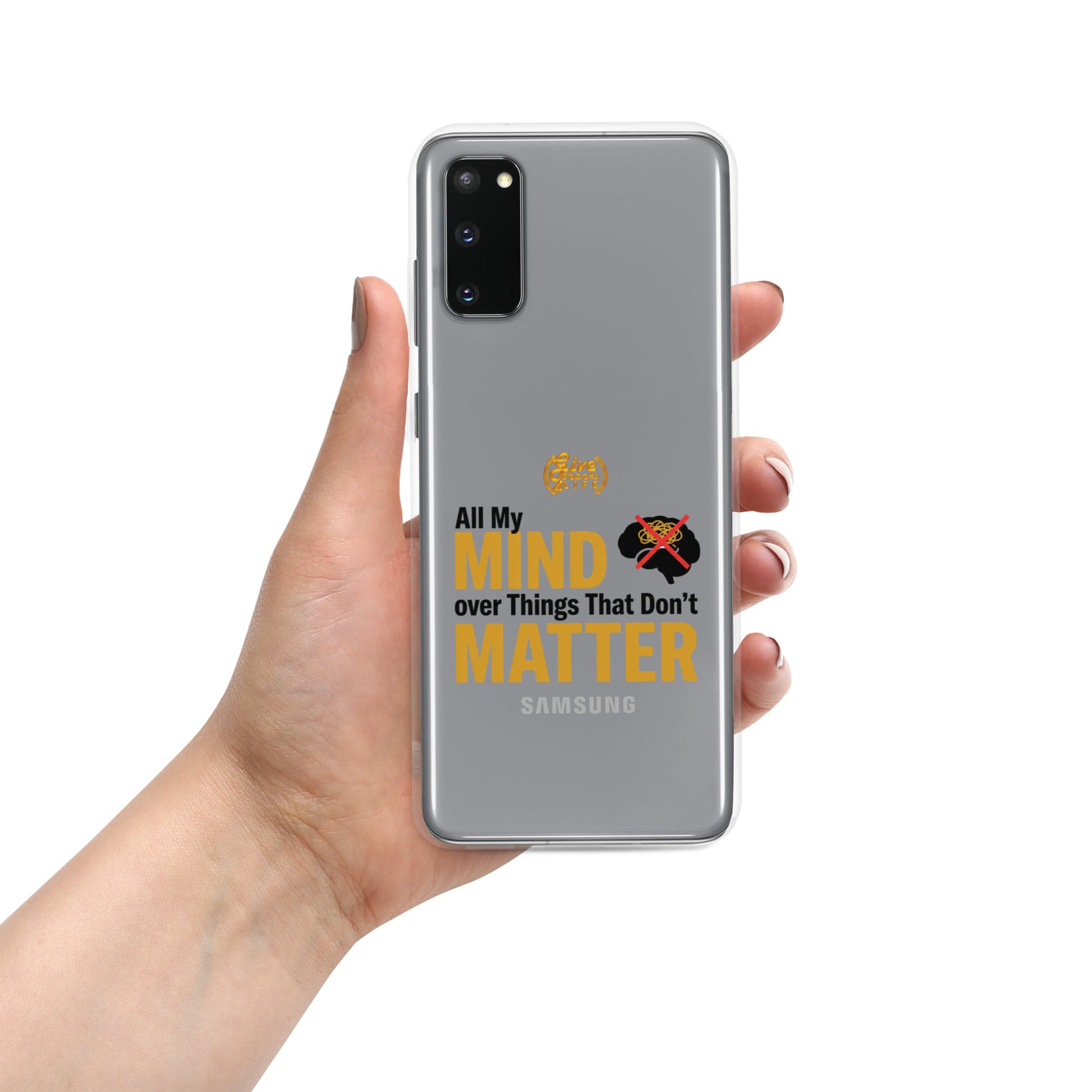 Hand holding a Samsung phone with a motivational quote on the case against a white background