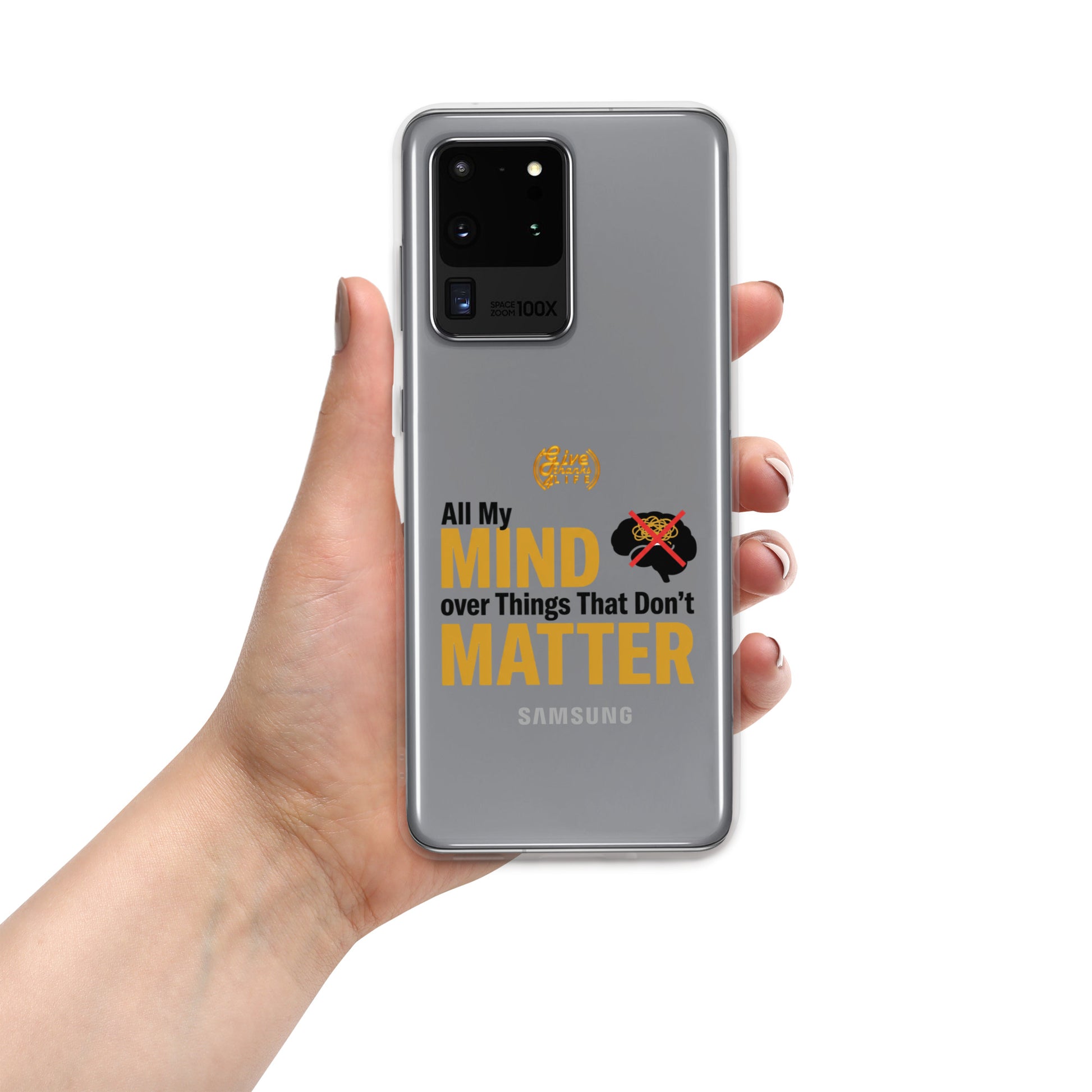 Phone case with green tribal design held by a hand on a white background