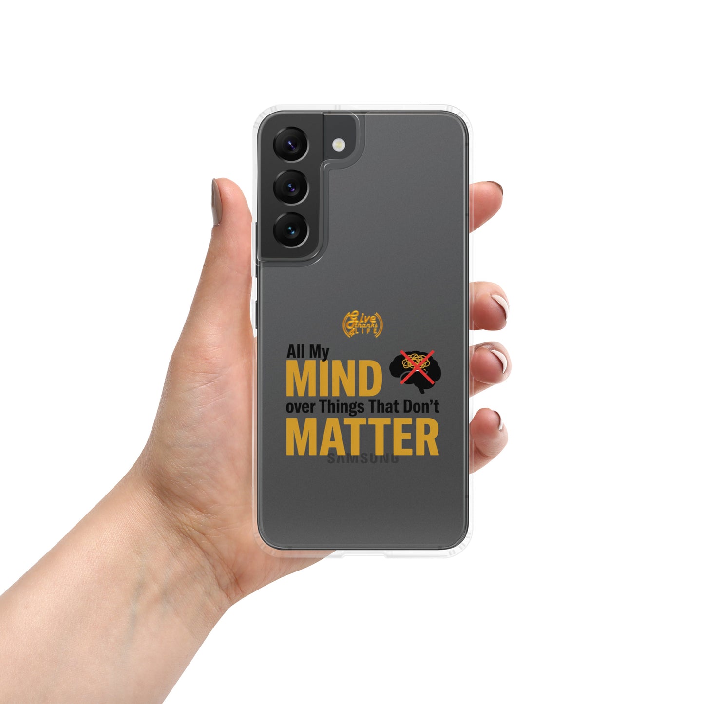 Phone case with text 'All My Mind over Things That Don't Matter' held by a hand on a white background