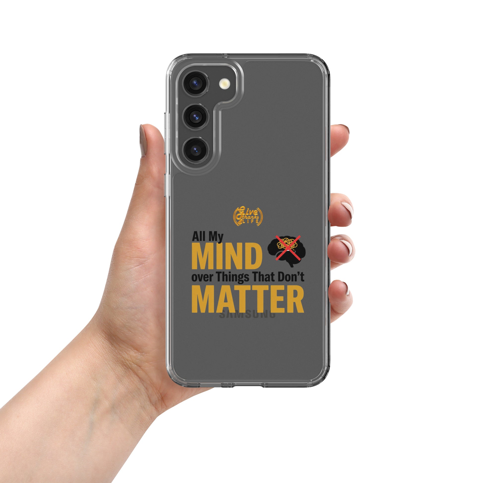 Phone case with 'All My Mind over Things That Don't Matter' text held by a hand