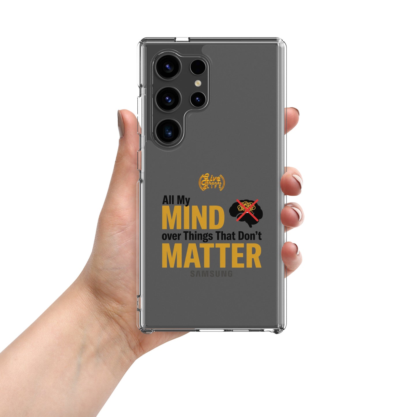 Phone case with text 'All My Mind over Things That Don't Matter' held by a hand on a white background