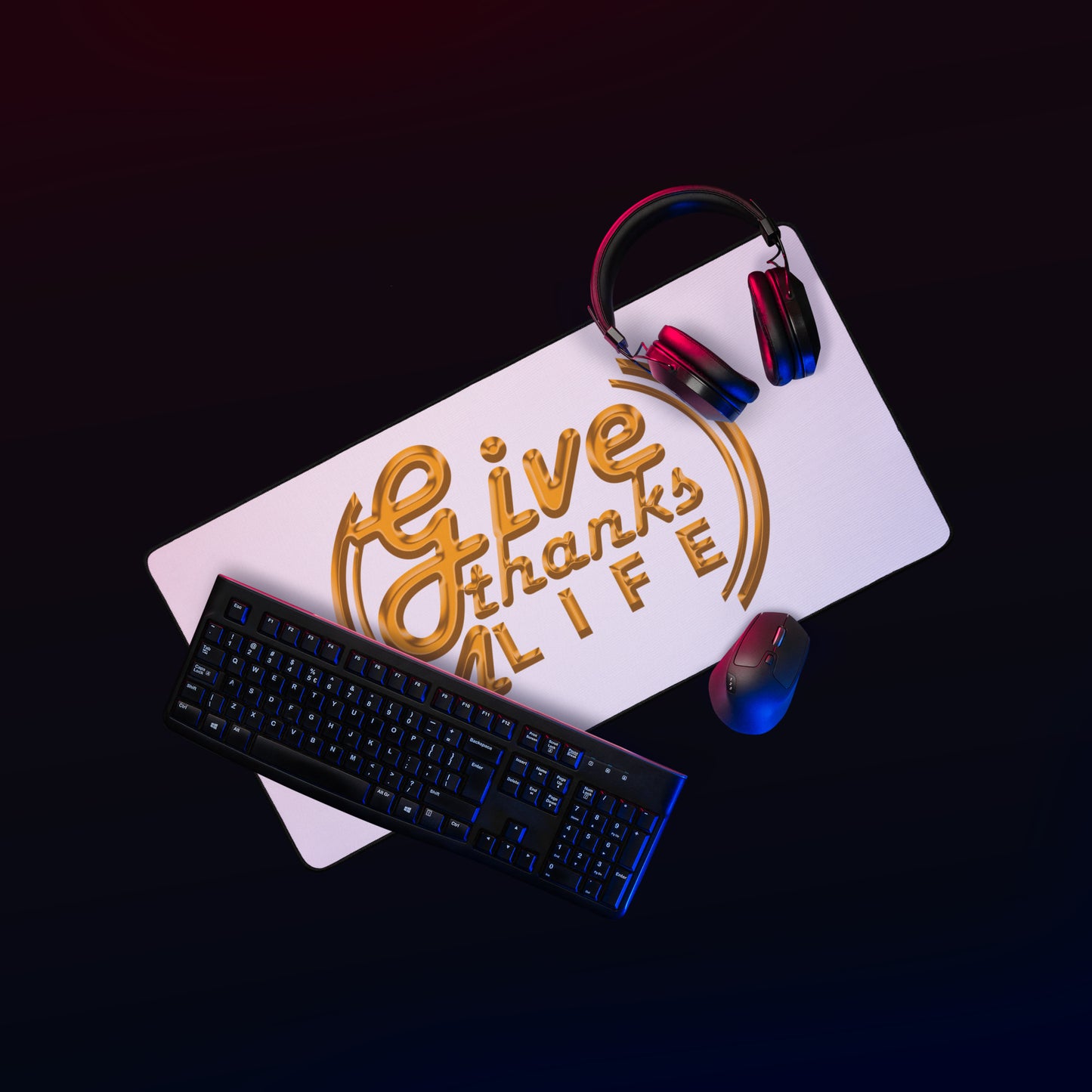 Desk setup with keyboard, mouse, headphones, and motivational plaque on a dark background