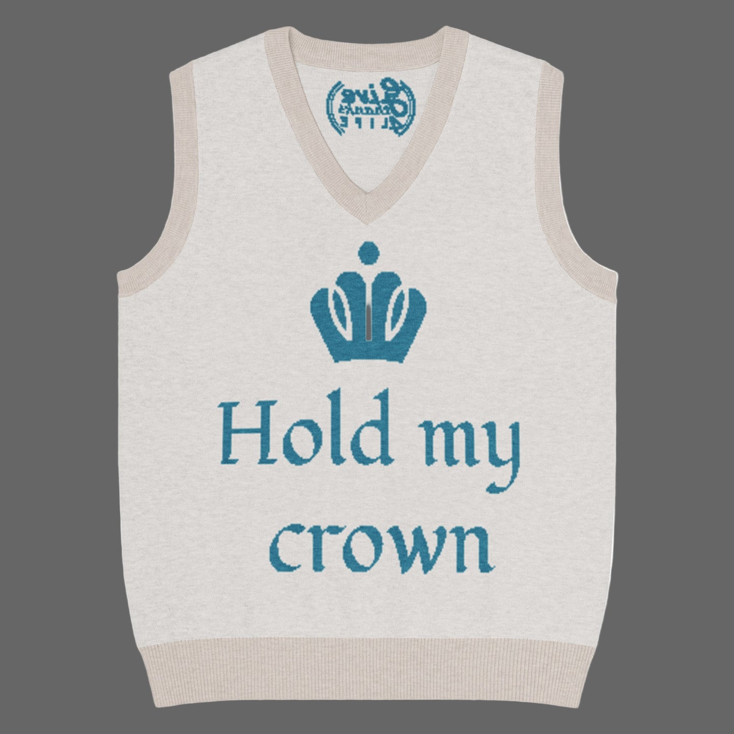 Beige sweater vest with blue text 'Hold my crown' and a crown graphic on a white background