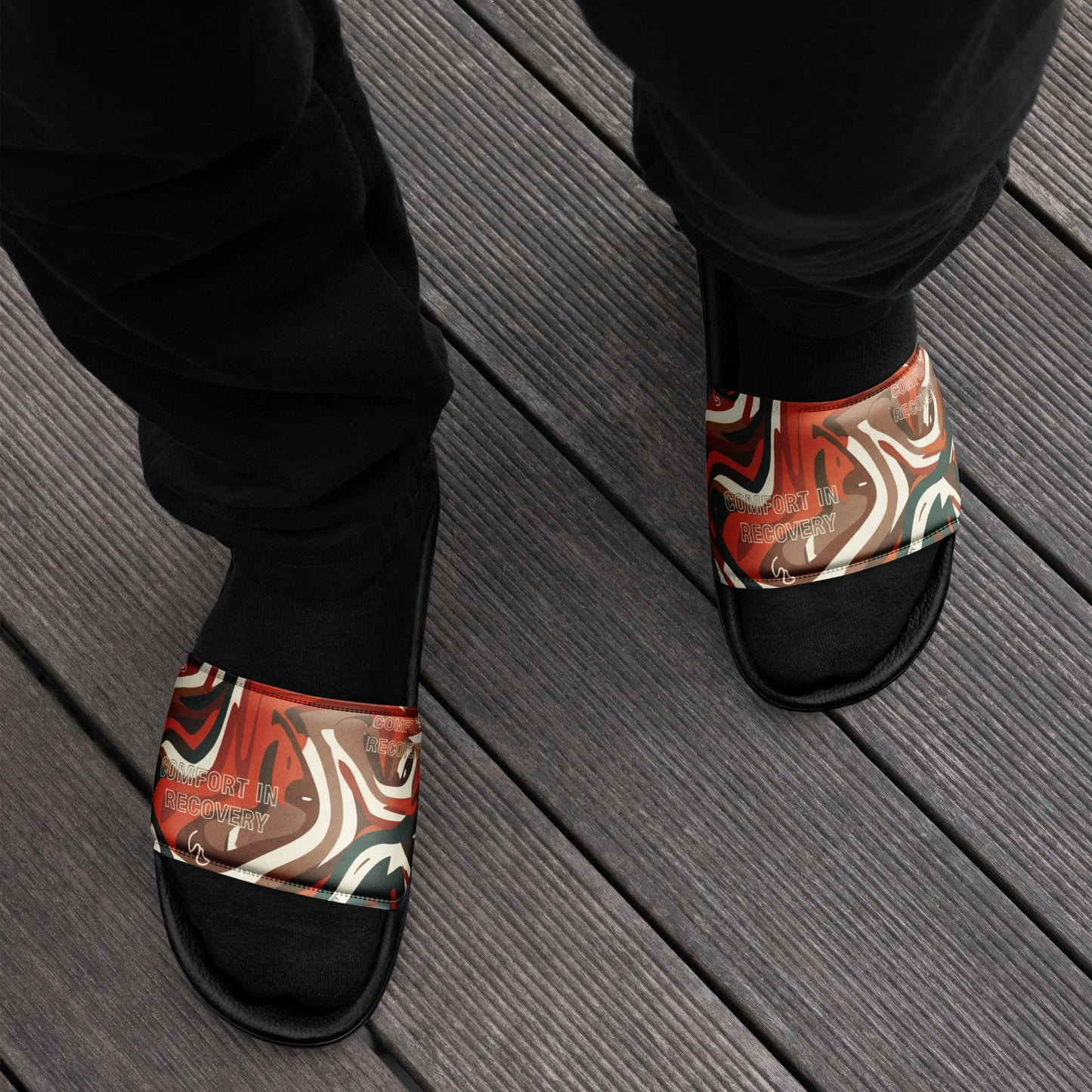 Colorful sandals worn on a wooden floor