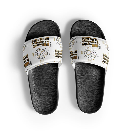 Pair of black slide sandals with Corvette logo on a white background