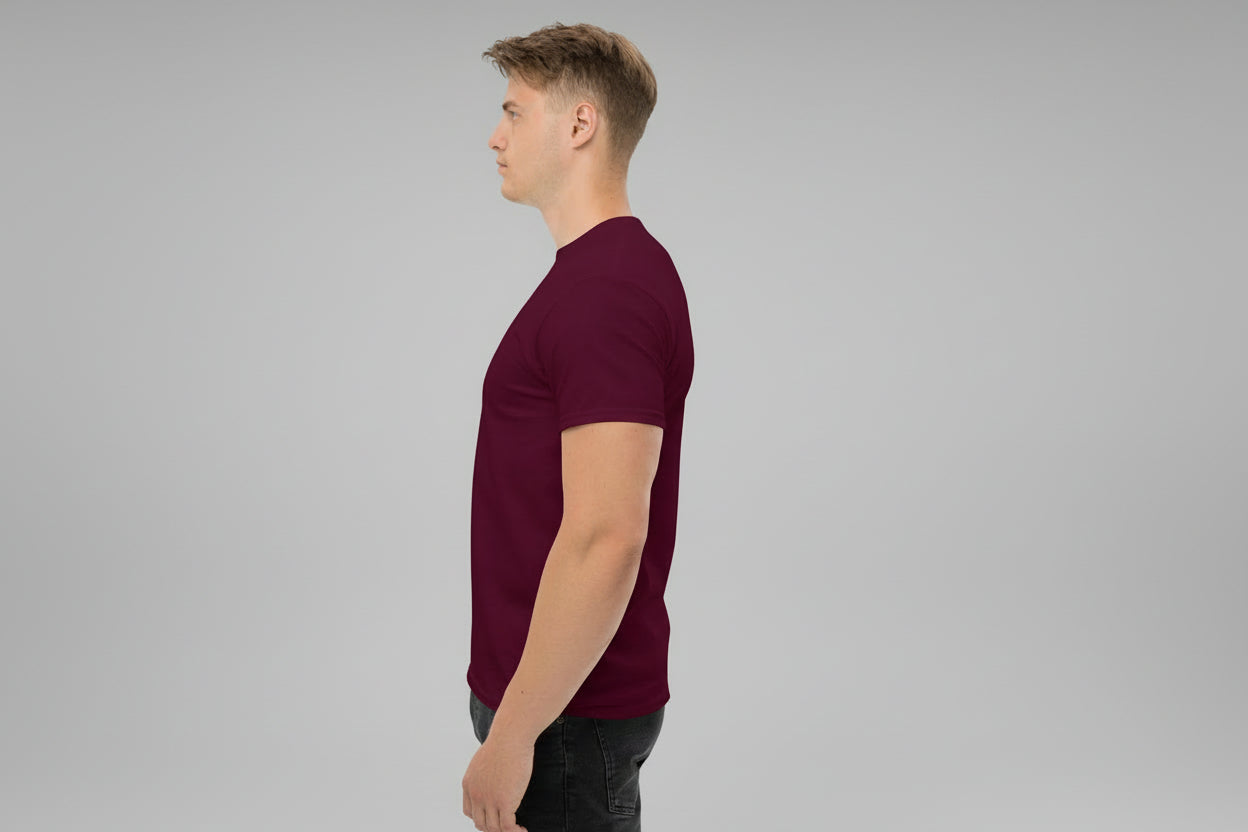 Man wearing a maroon t-shirt on a white background