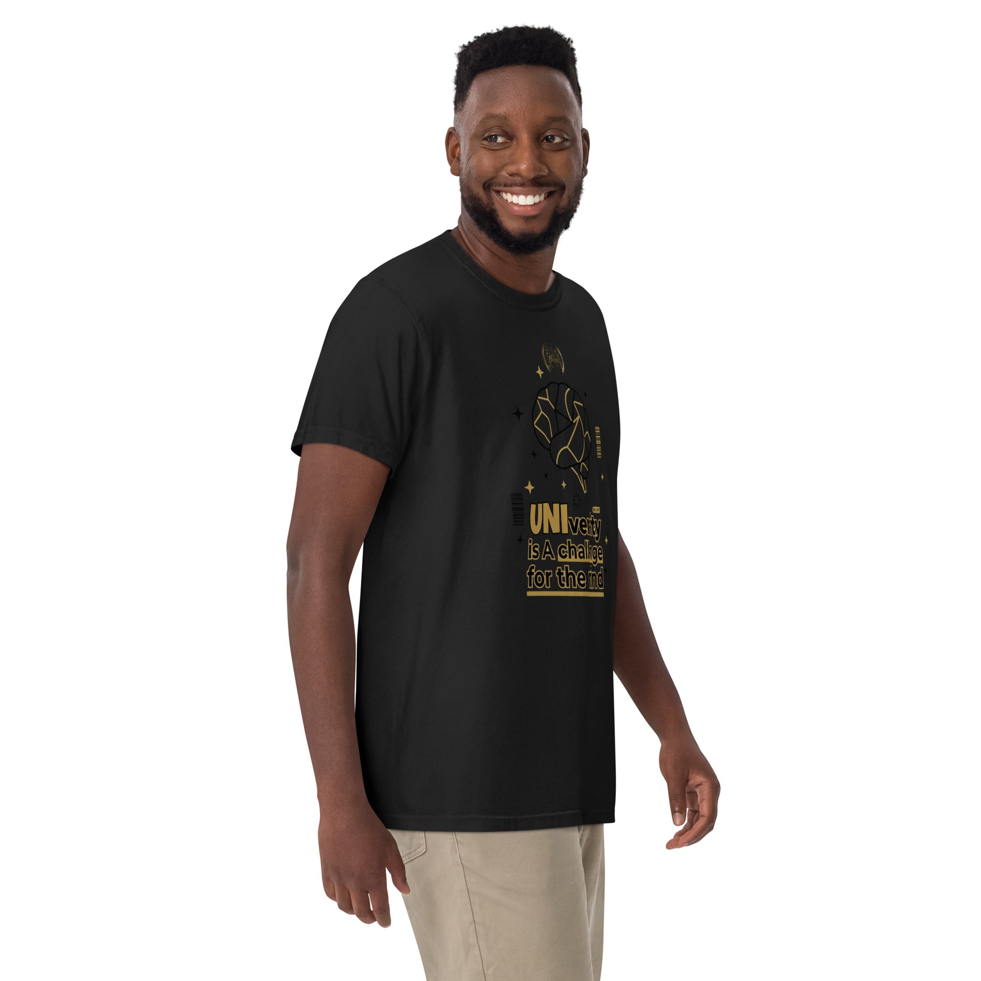 Man wearing a black t-shirt with a graphic design on a white background
