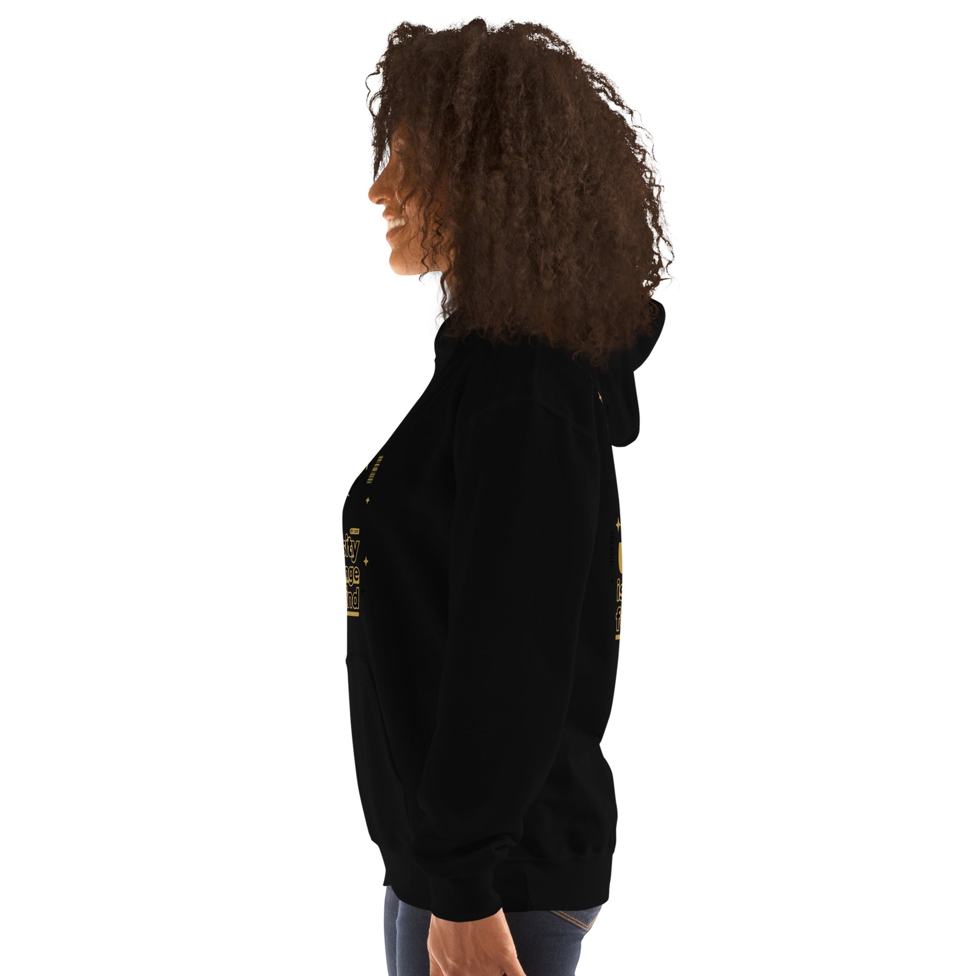 Person wearing a black hoodie with a small logo on the chest against a white background
