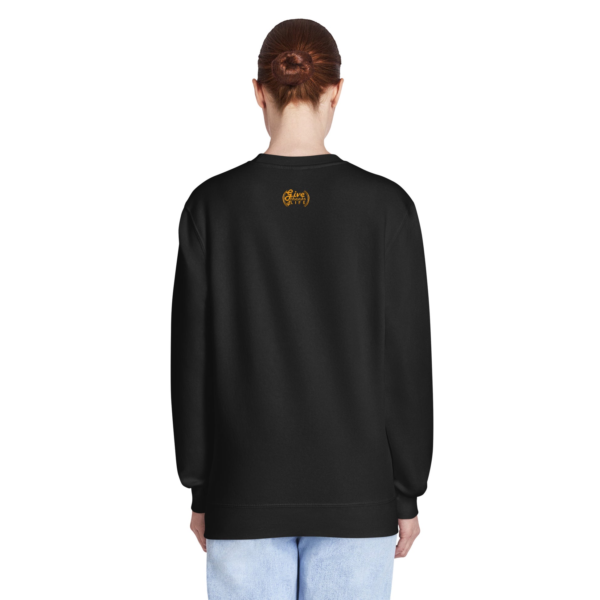 Person wearing a black sweatshirt on a white background