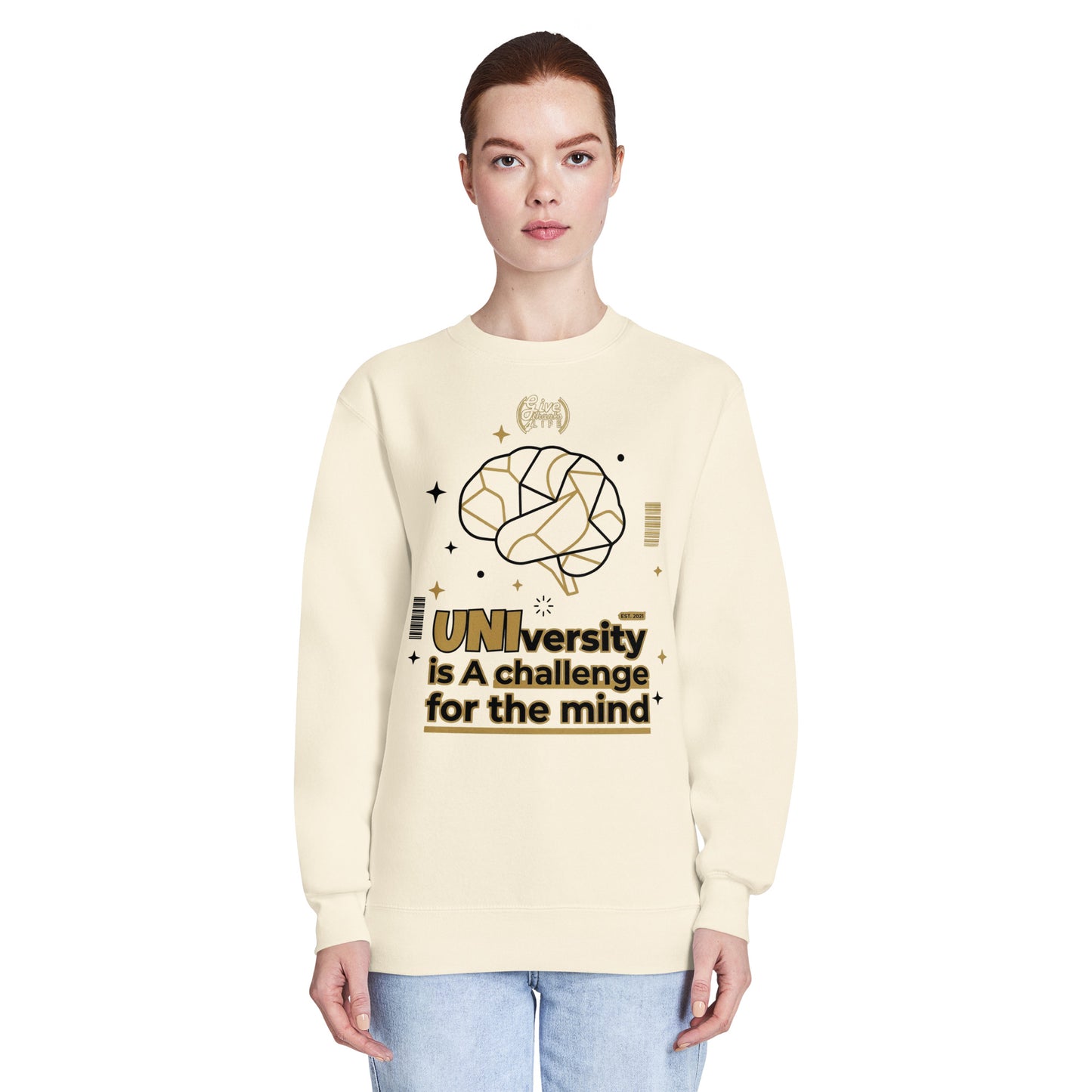 Person wearing a cream-colored sweatshirt with a graphic design and text on a white background