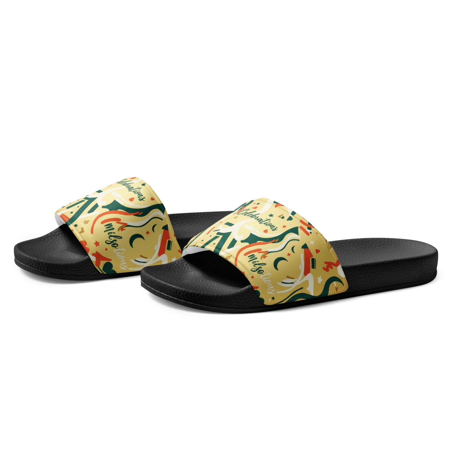 Pair of slides with colorful patterned straps on a white background
