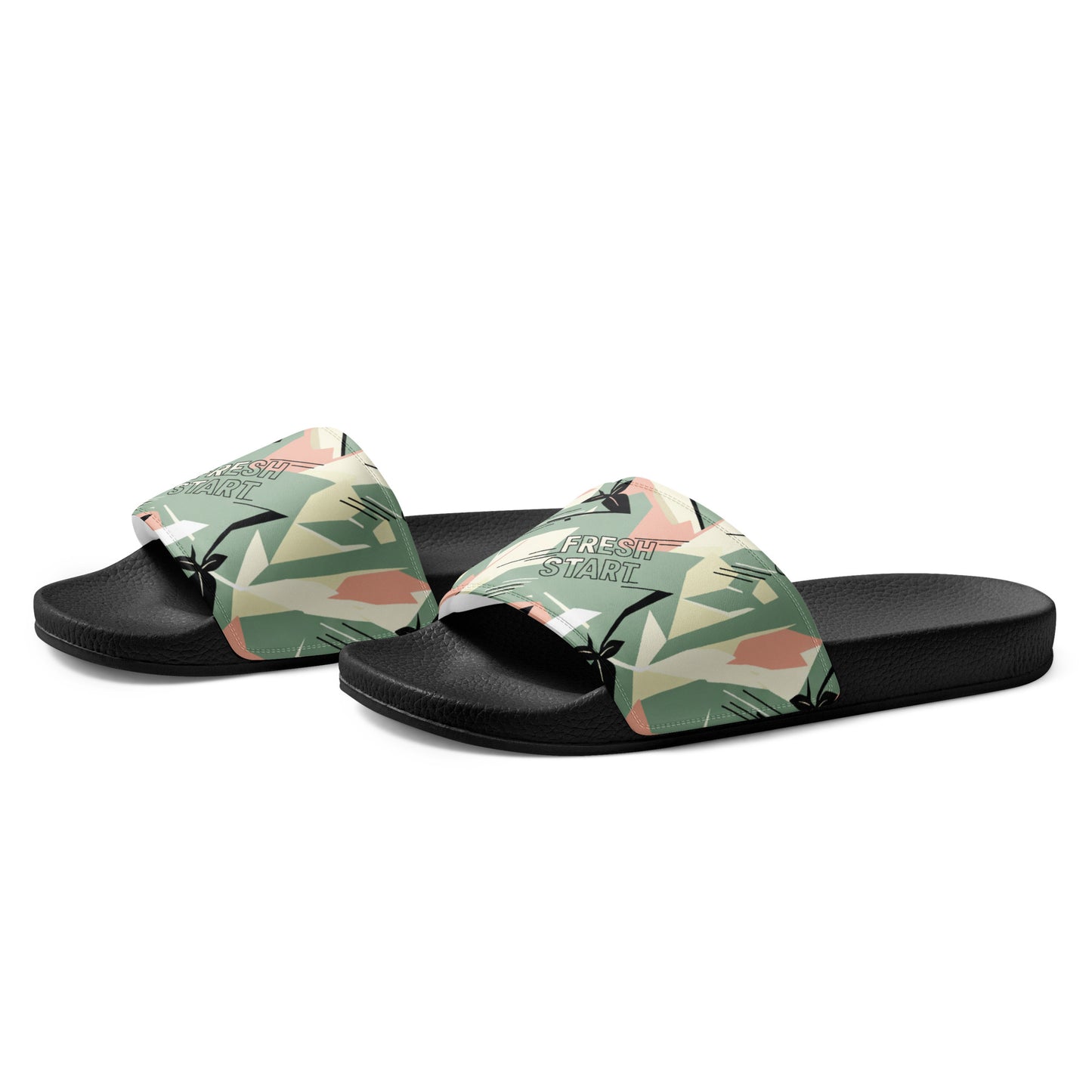 Pair of slides with decorative straps on a white background