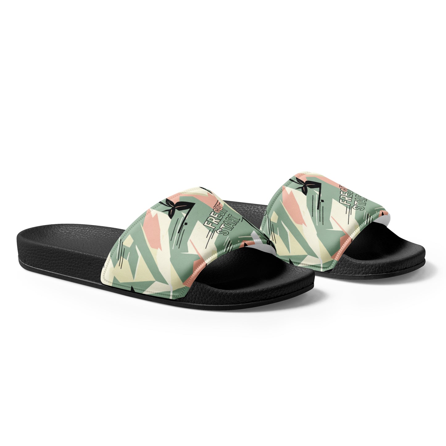 Pair of slides with tropical leaf pattern on a white background