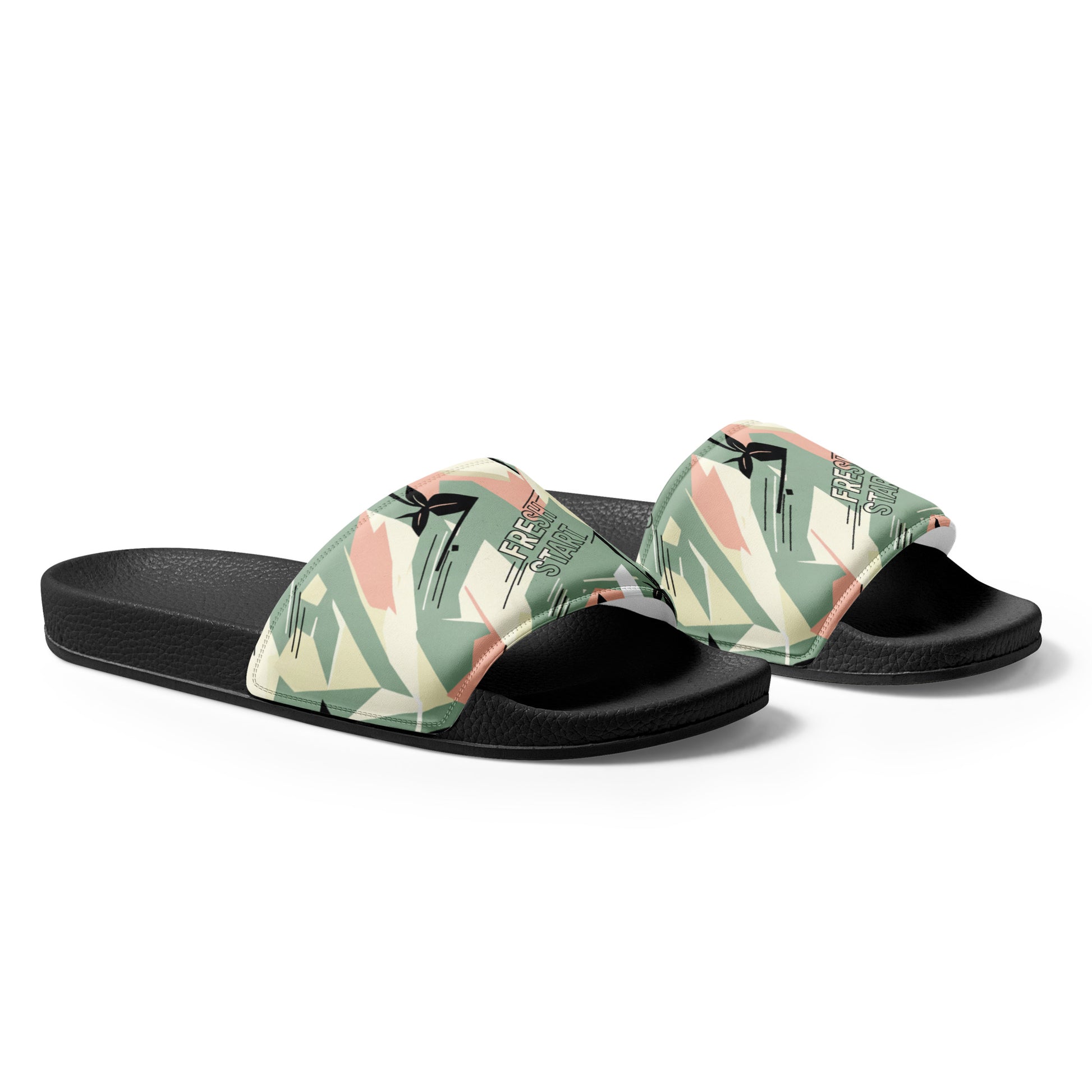 Pair of slides with tropical leaf pattern on a white background