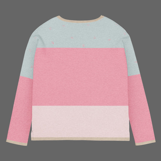Color-blocked sweater with pink and light blue sections on a white background