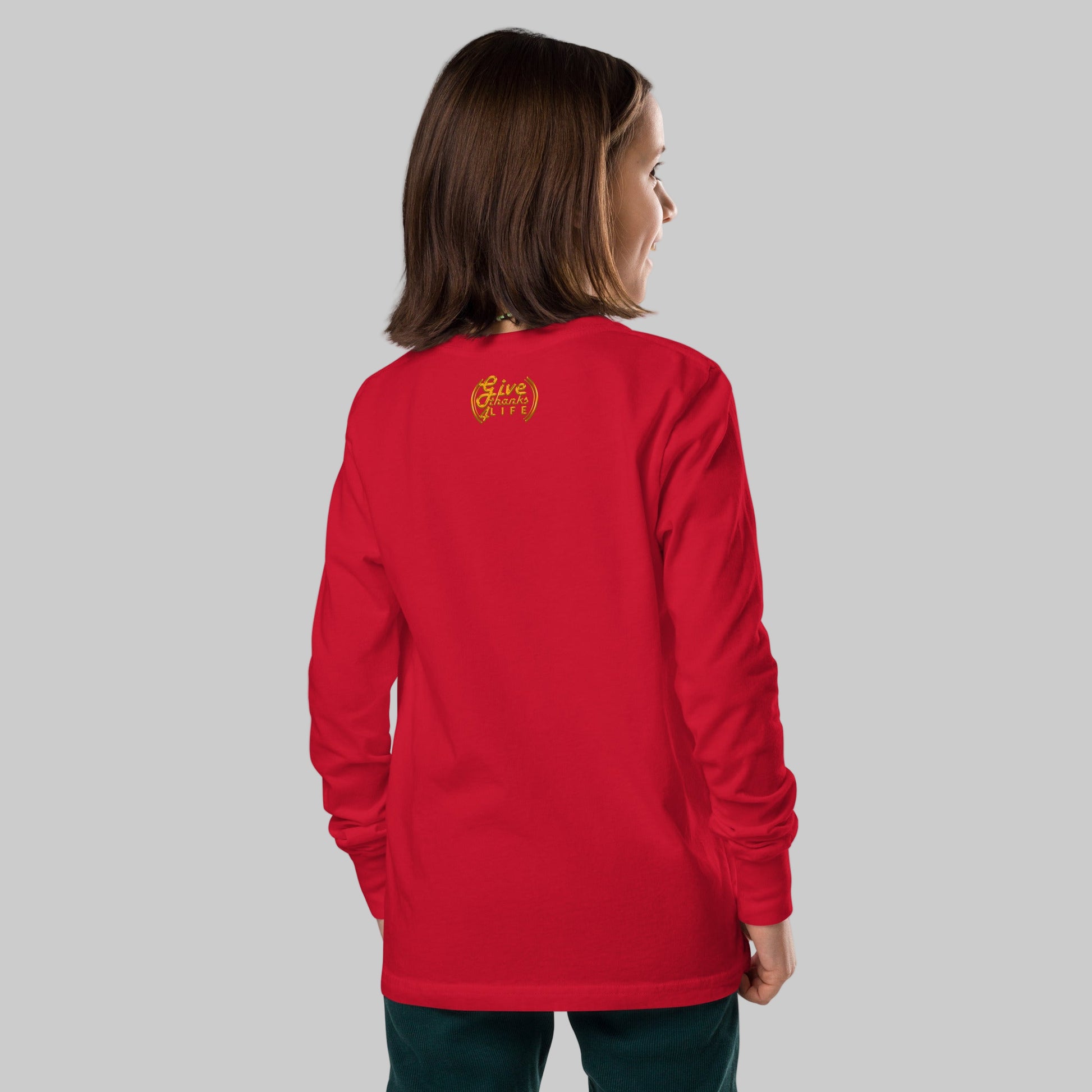 Person wearing a red long-sleeve shirt with a logo on the back, on a white background