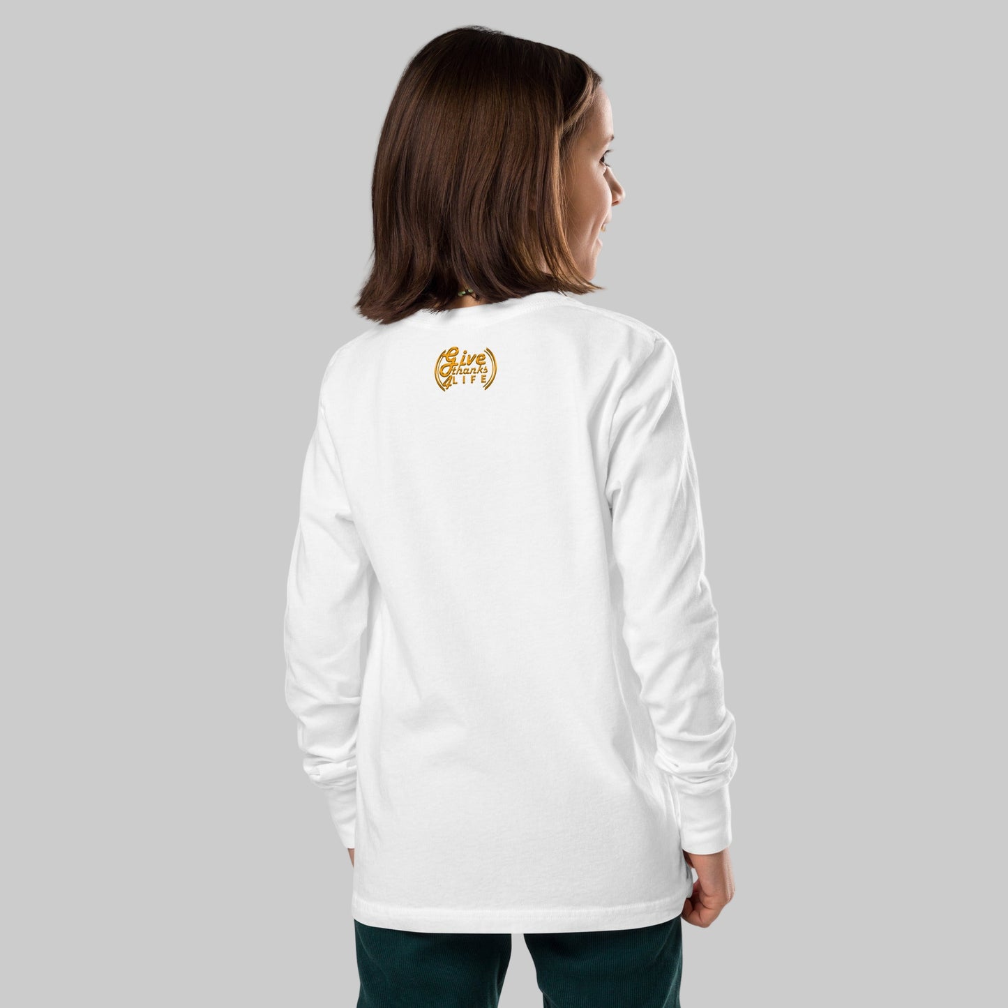 Person wearing a white long-sleeve shirt with a logo on the back, standing against a white background