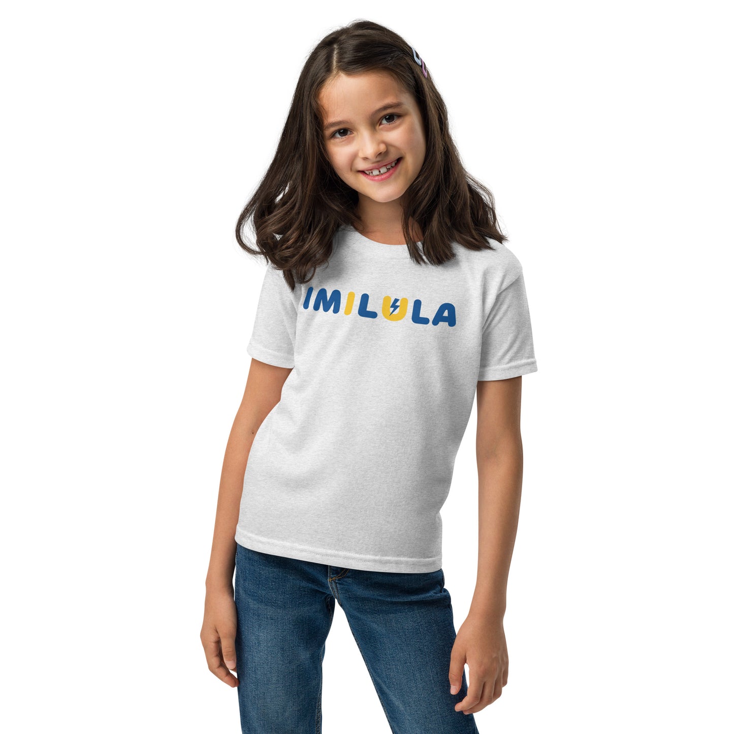 Young girl wearing a white t-shirt with a small logo on a white background