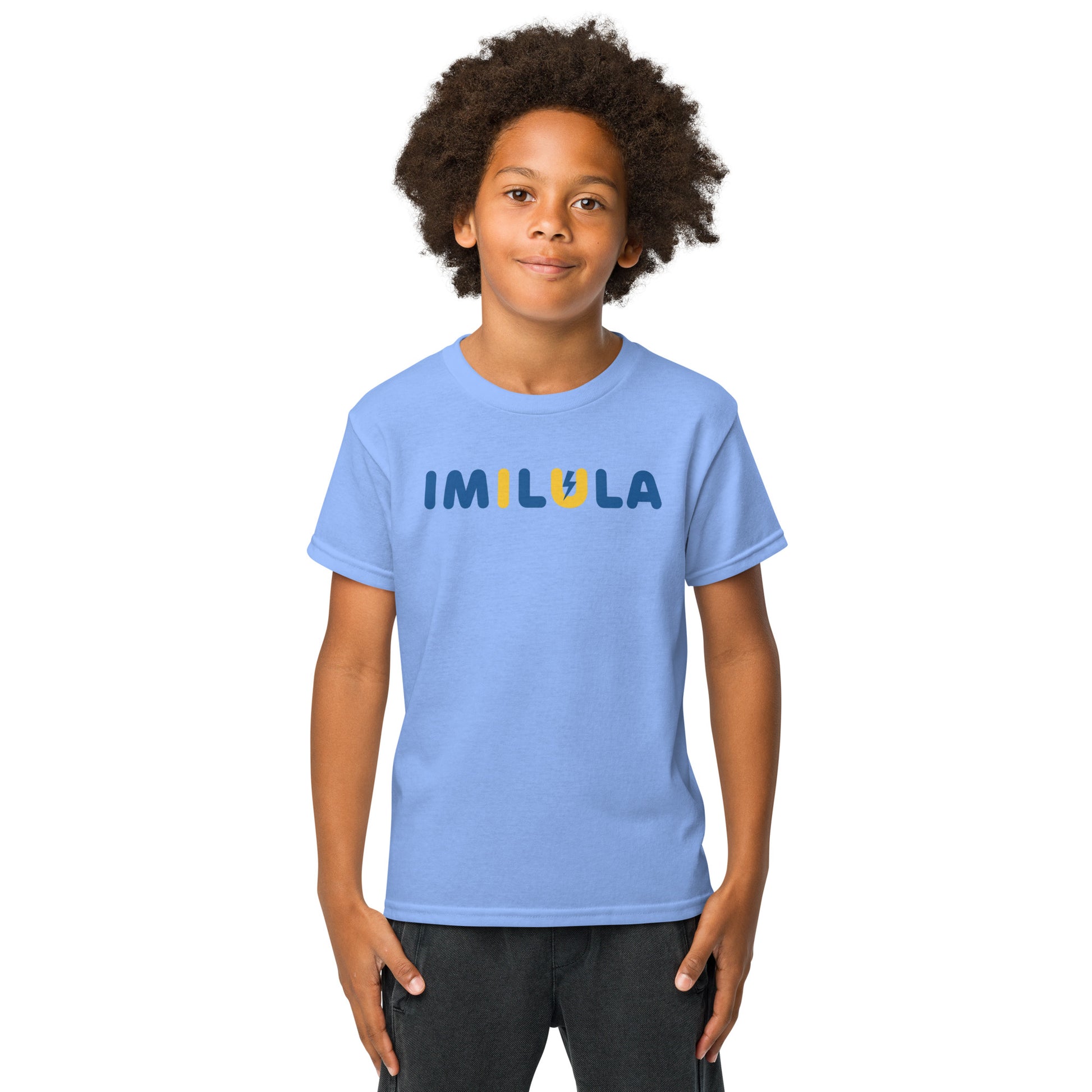 Child wearing a light blue t-shirt with a smiley face design on a white background
