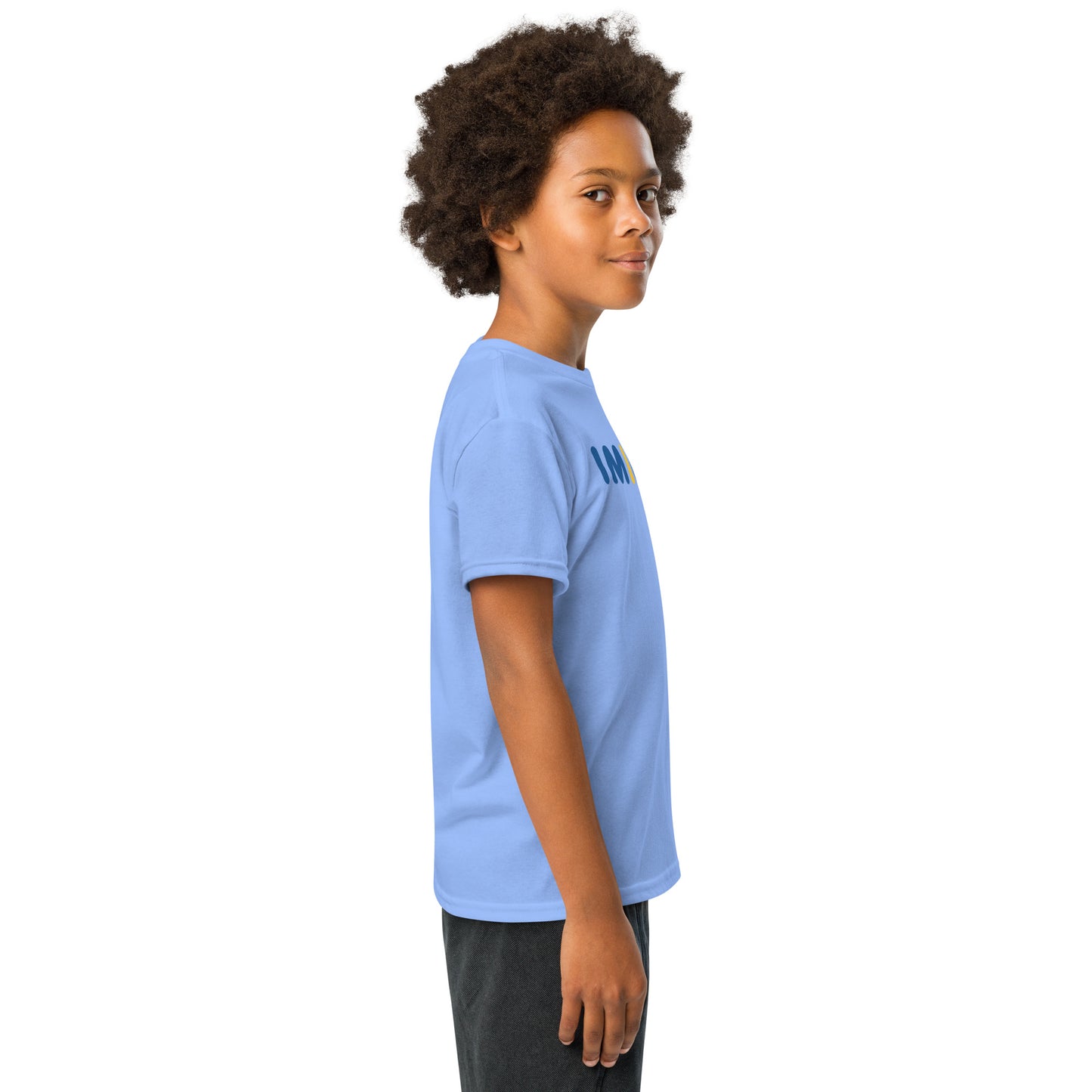 Child wearing a light blue t-shirt with a logo on a white background
